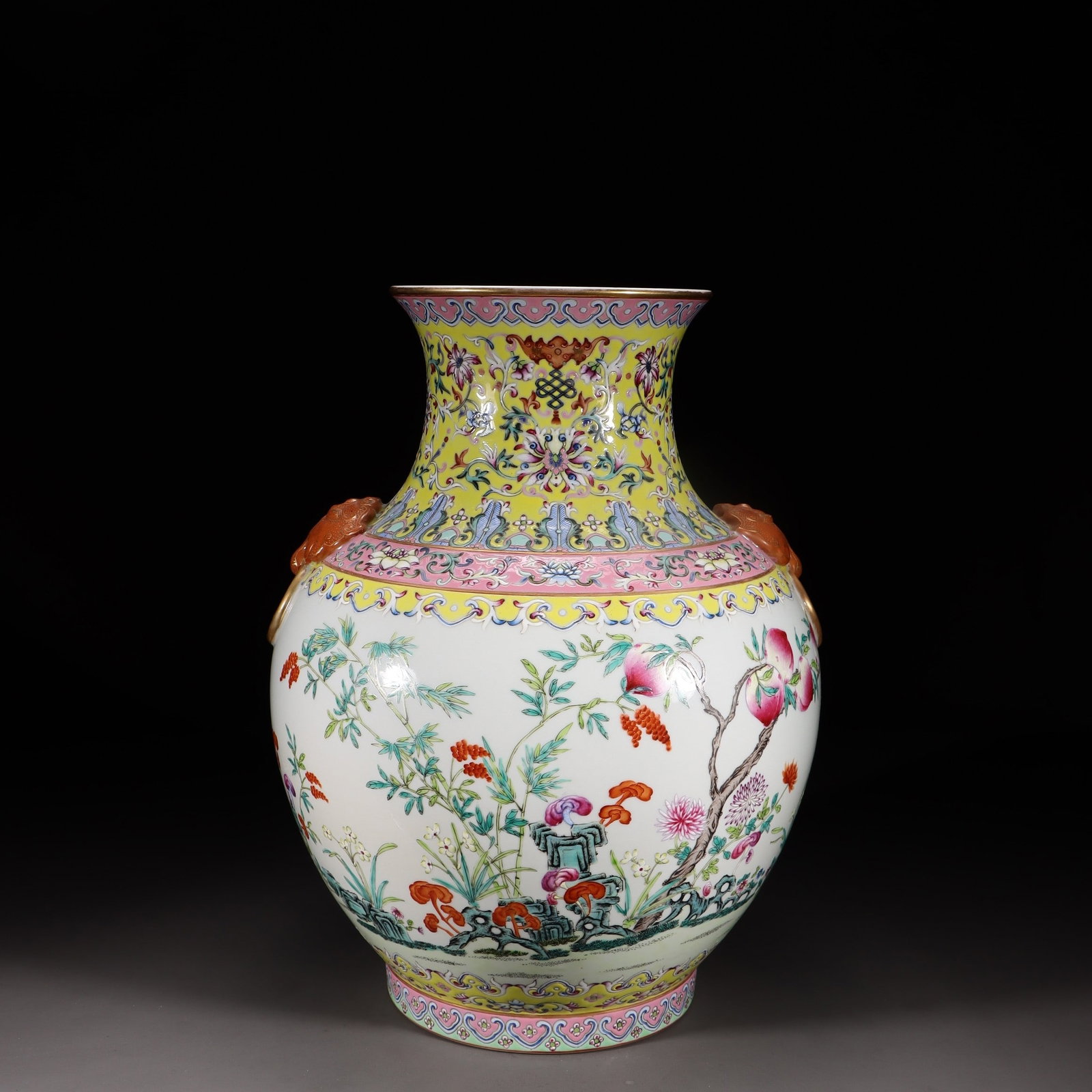 A Fencai Enamel Bird-and-Peach Elephant-Ear Vase: A Fencai Enamel Bird-and-Peach Elephant-Ear Vase. Height: 13.11in Length: 9.65in Diameter: 9.45in Weight: 8.71lbs.