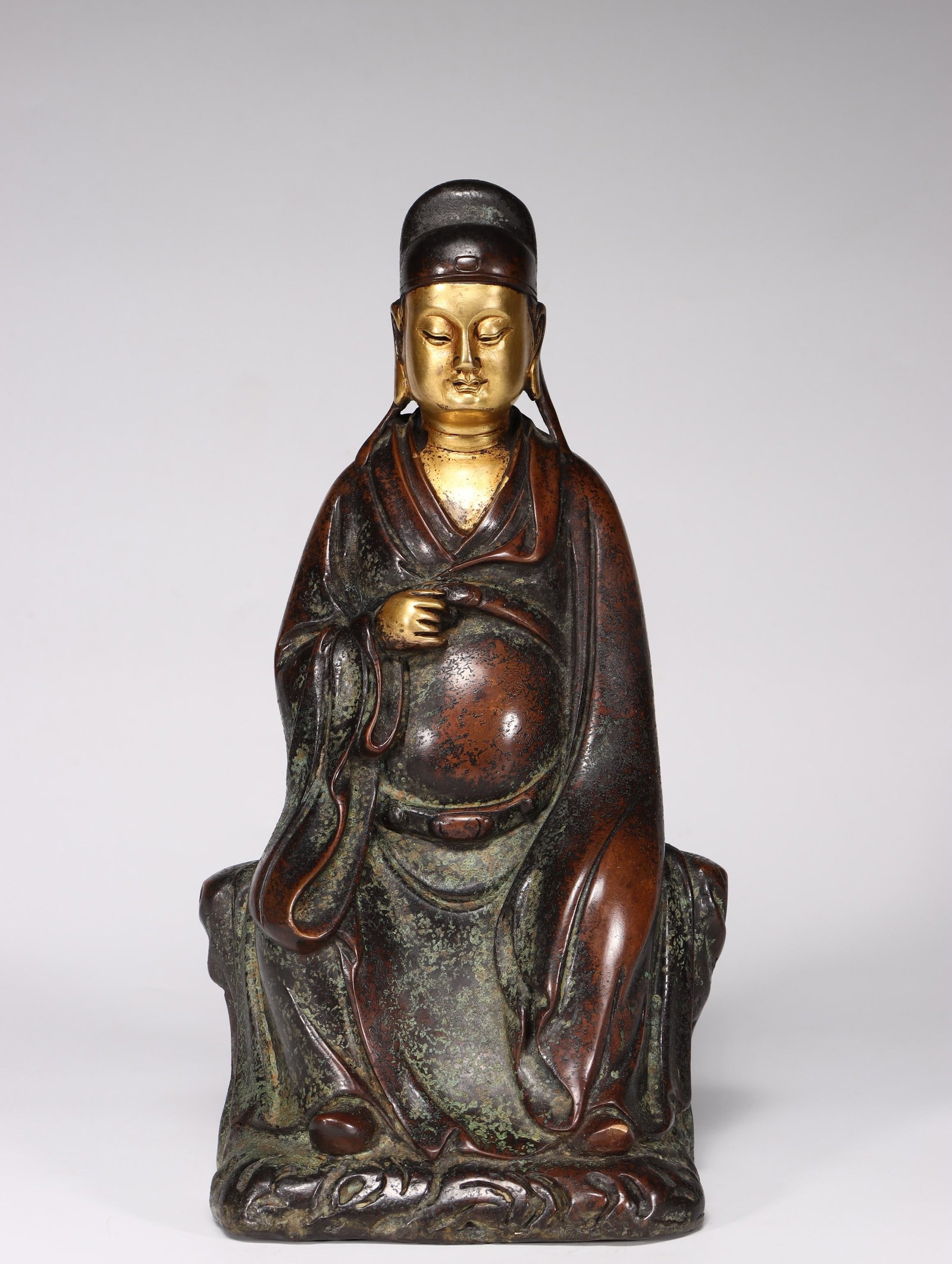 A Bronze Gilt Wenchang Figure: A Bronze Gilt Wenchang Figure. Dimensions: 10.24in x 5.51in x 4.21in Weight: 8.27lbs.
