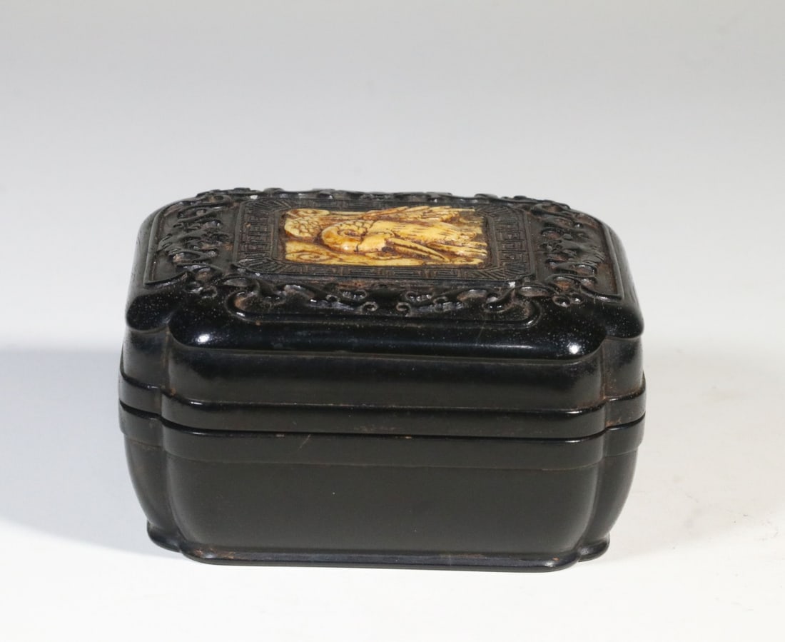 A Zitan Wood Inlaid Carved Cloud-and-Crane Incense Box: A Zitan Wood Inlaid Carved Cloud-and-Crane Incense Box. Dimensions: 2.01in x 3.66in x 3.39in Weight: 0.39lbs.