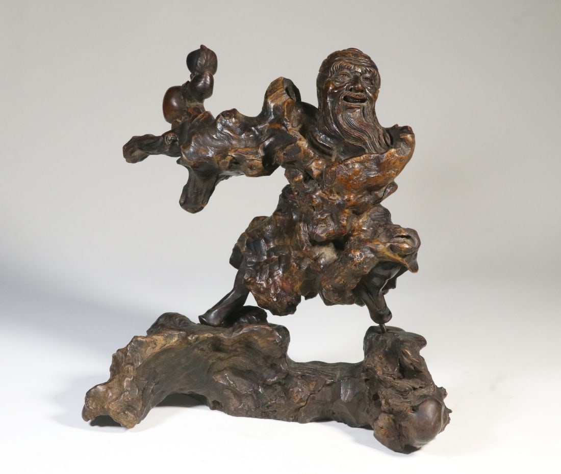 A Cherry-Burl Carved Longevity-Figure Ornament: A Cherry-Burl Carved Longevity-Figure Ornament. Dimensions: 8.35in x 8.11in x 5.67in Weight: 1.38lbs.
