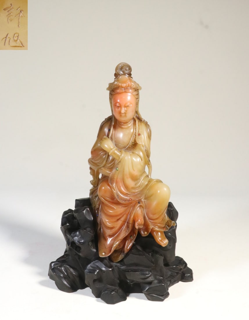A Shoushan Furong Stone Seated Guanyin Figure: A Shoushan Furong Stone Seated Guanyin Figure. Dimensions: 8.07in x 3.54in x 2.36in Weight: 1.15lbs.