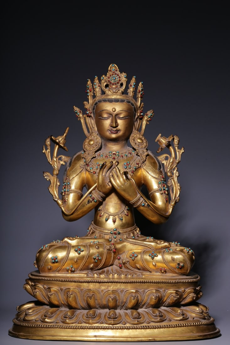 A Bronze Gilt Inlaid Manjushri Figure: A Bronze Gilt Inlaid Manjushri Figure. Dimensions: 20.28in x 15.16in x 10.43in Weight: 94.34lbs.