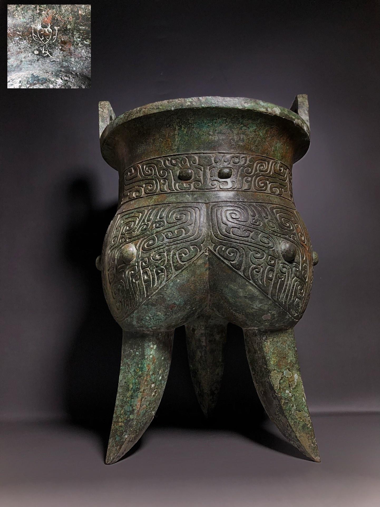 A Bronze Kui-Dragon Ding: A Bronze Kui-Dragon Ding. Dimensions: 13.39in x 13.39in x 21.65in Weight: 66.14lbs.