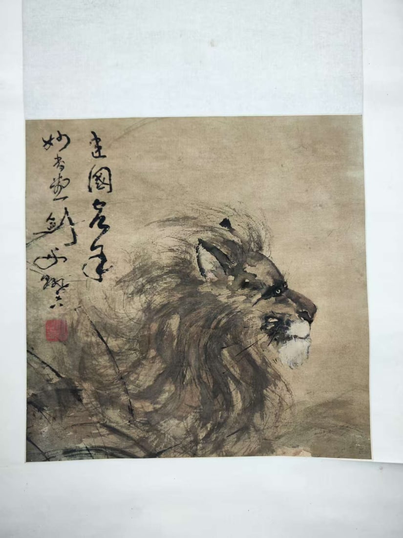 A Hanging Scroll Depicting a Lion: A Hanging Scroll Depicting a Lion. Dimensions: 12.99in x 12.99in.