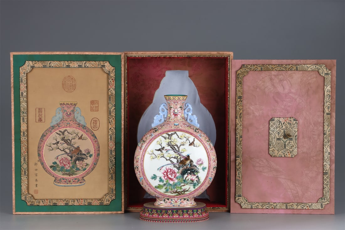 A Porcelain Vase with Floral Window and Bird Motif: A Porcelain Vase with Floral Window and Bird Motif. Height: 10.94in; Diameter: 8.07in.