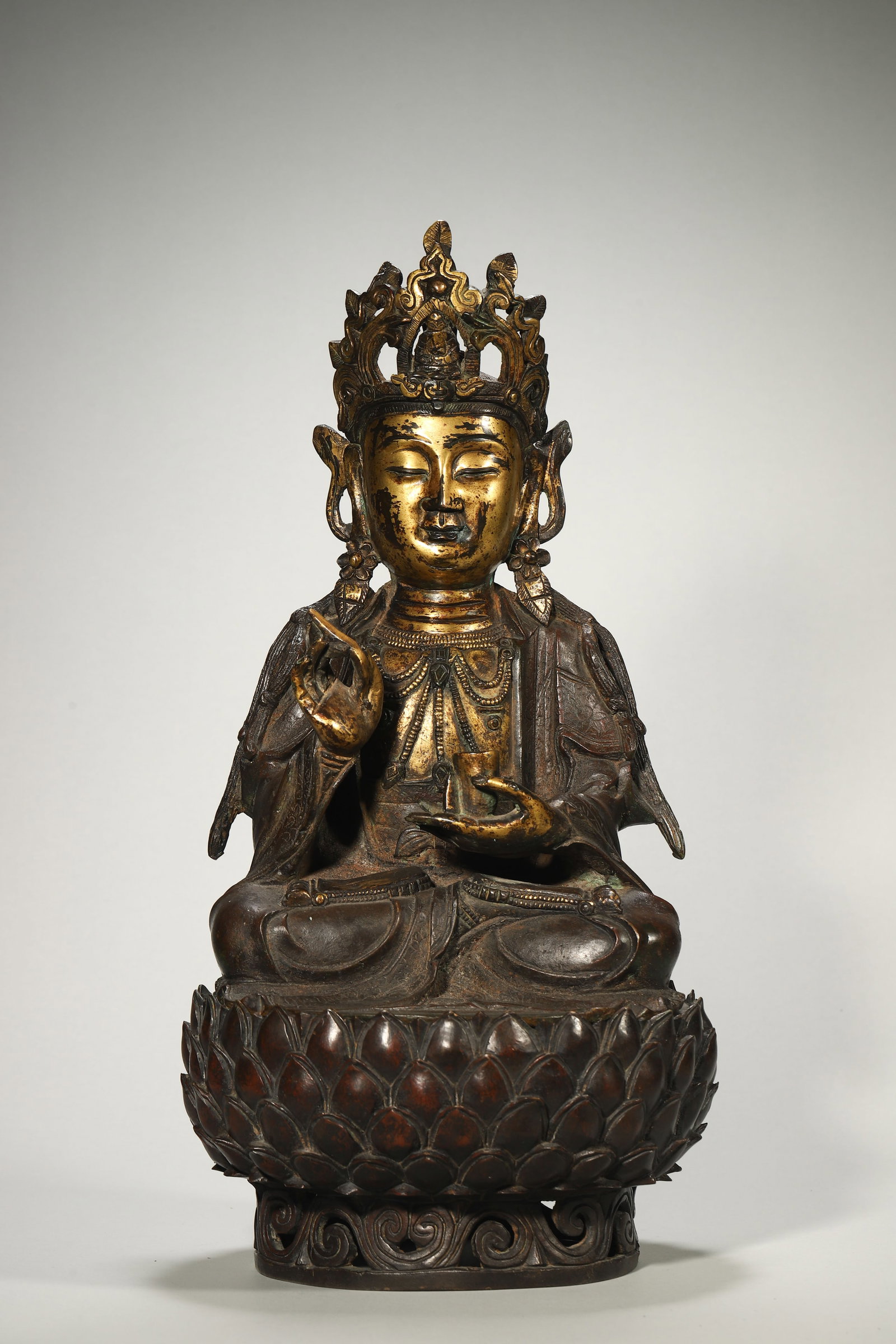 A Gilt-Bronze Guanyin Statue: A Gilt-Bronze Guanyin Statue. Height: 17.32in; Width: 7.87in.