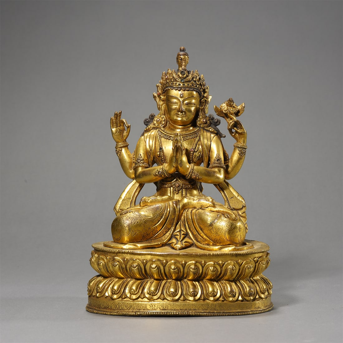 A Gilt-Bronze Statue of Four-Armed Avalokiteshvara in Tibetan Style: A Gilt-Bronze Statue of Four-Armed Avalokiteshvara in Tibetan Style. Height: 8.86in.