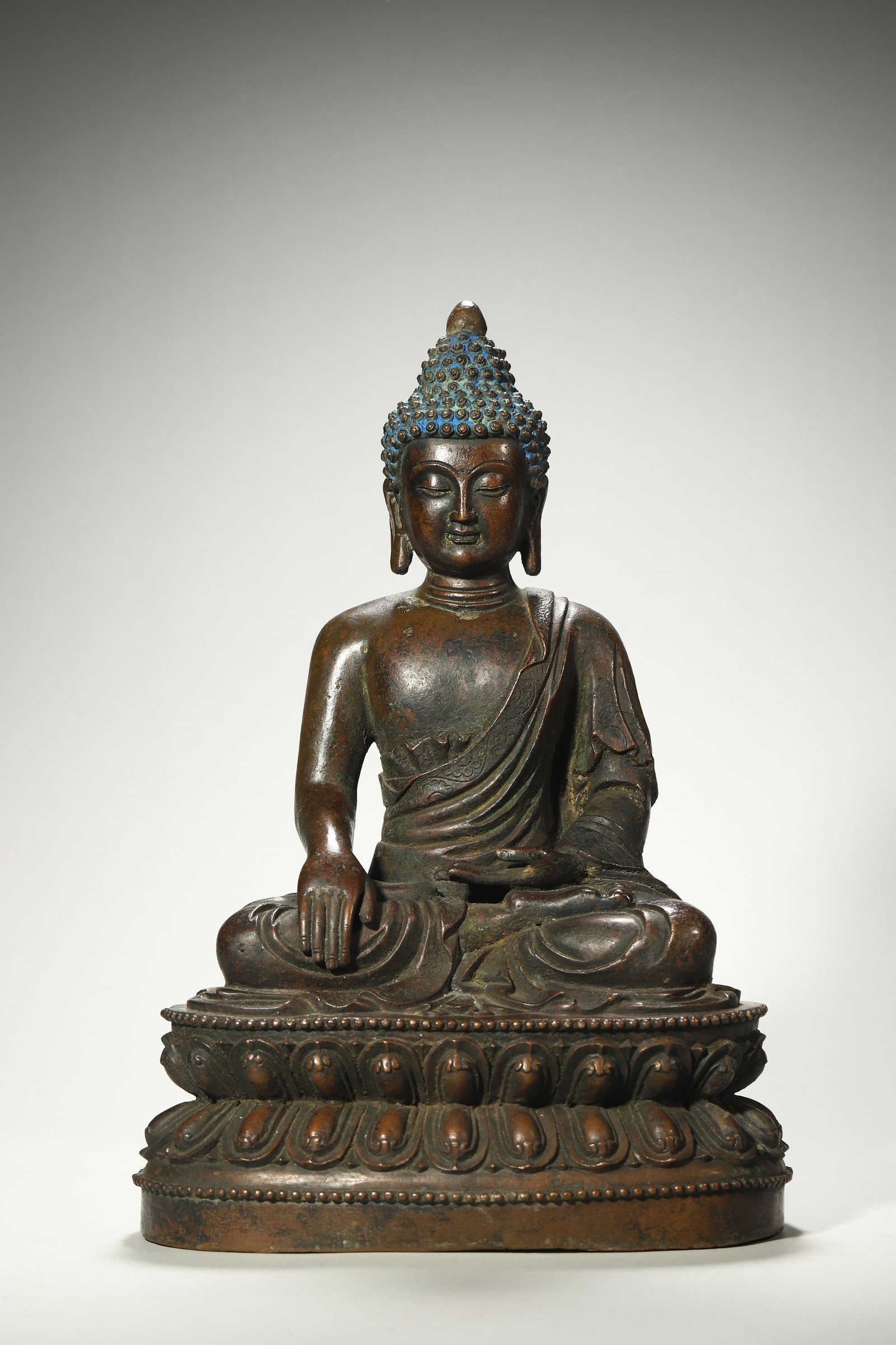 A Bronze Statue of Shakyamuni: A Bronze Statue of Shakyamuni. Height: 14.41in; Base Width: 9.45in.