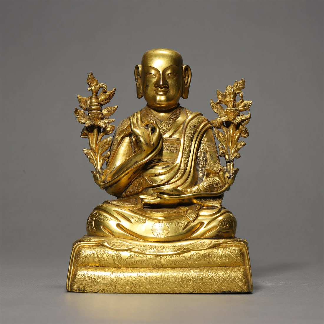 A Gilt-Bronze Lama Statue: A Gilt-Bronze Lama Statue. Height: 6.30in.