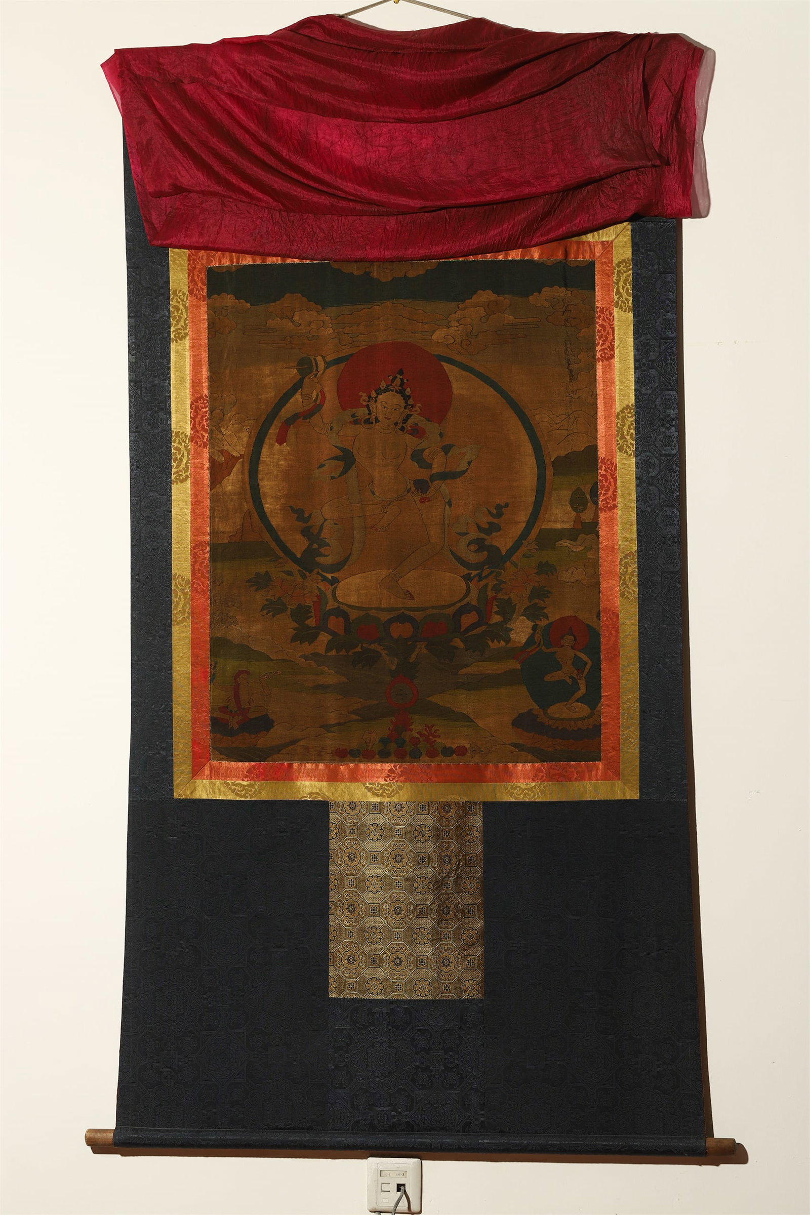 A Silk Tangka Depicting Dakini: A Silk Tangka Depicting Dakini. Width: 24.41in; Width: 31.10in.