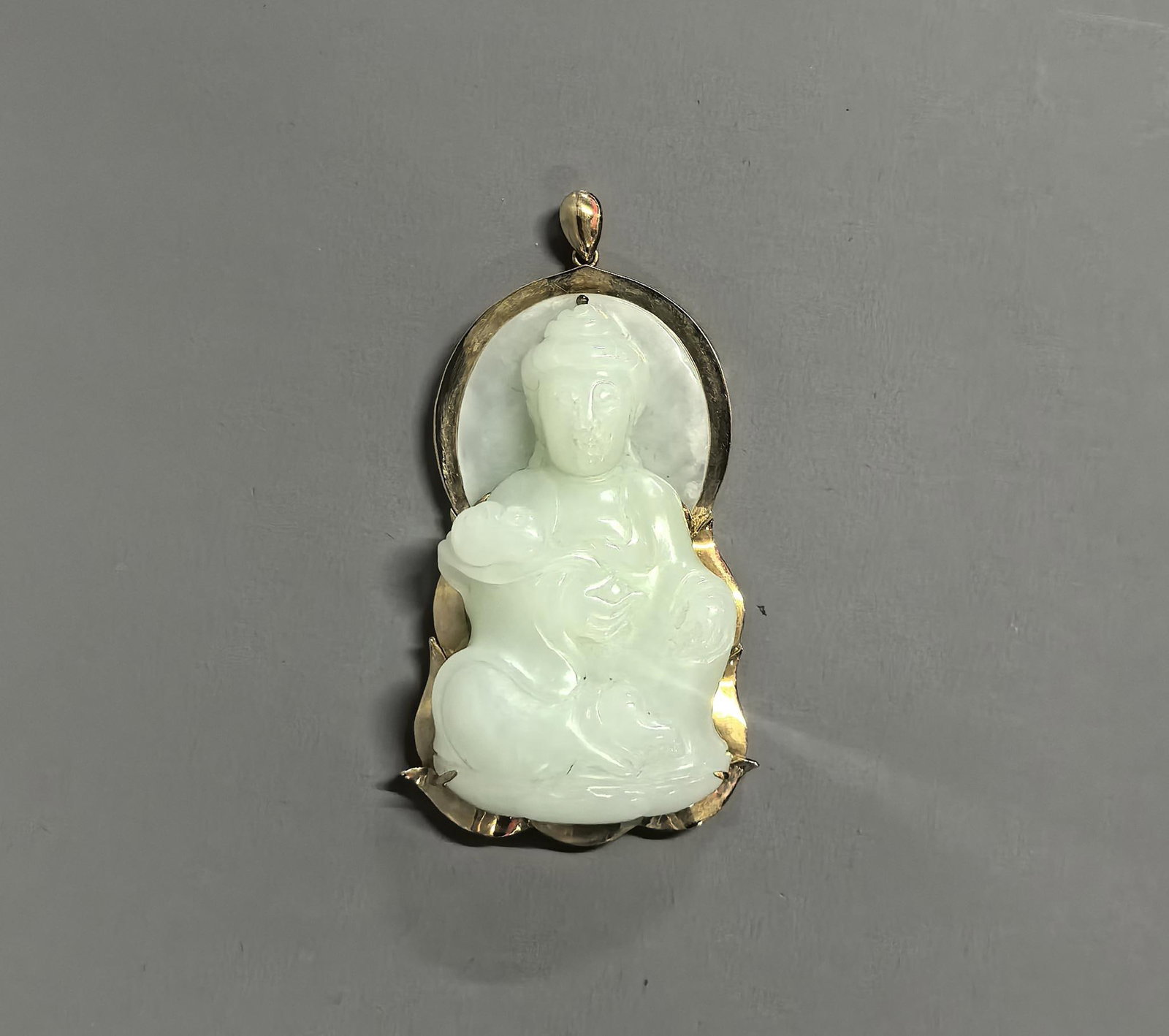 An 18K Gold Pendant Inlaid with Hetian Jade Guanyin (1 of 4)
