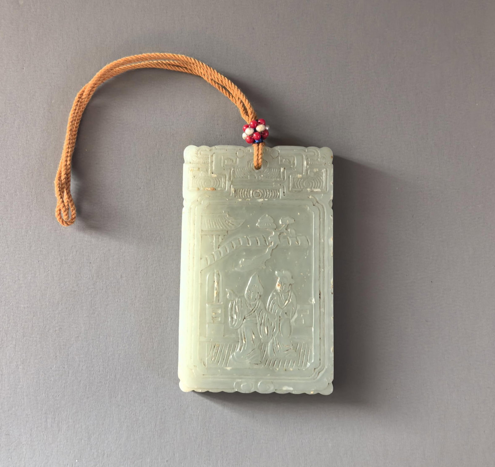 A White-Jade Figure Plaque: A White-Jade Figure Plaque. Dimensions: 2.68in x 1.69in; Weight: 0.14lb.
