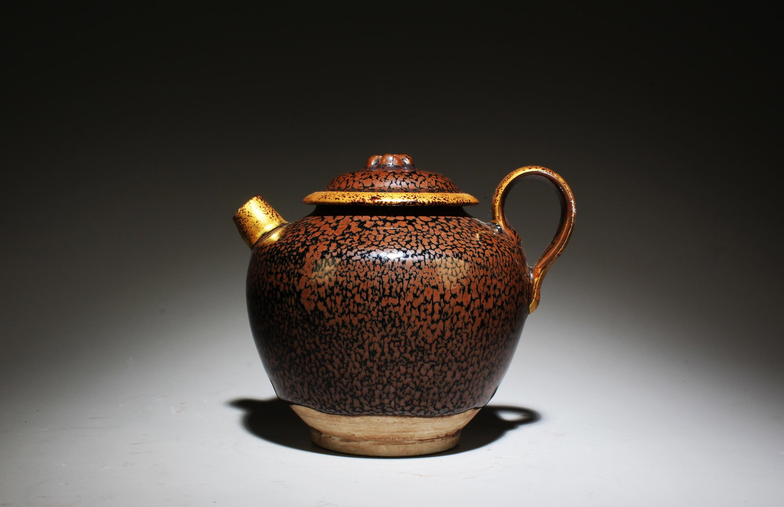 A Jianyao Teapot: A Jianyao Teapot. Dimensions: 5.3" x 4.5".