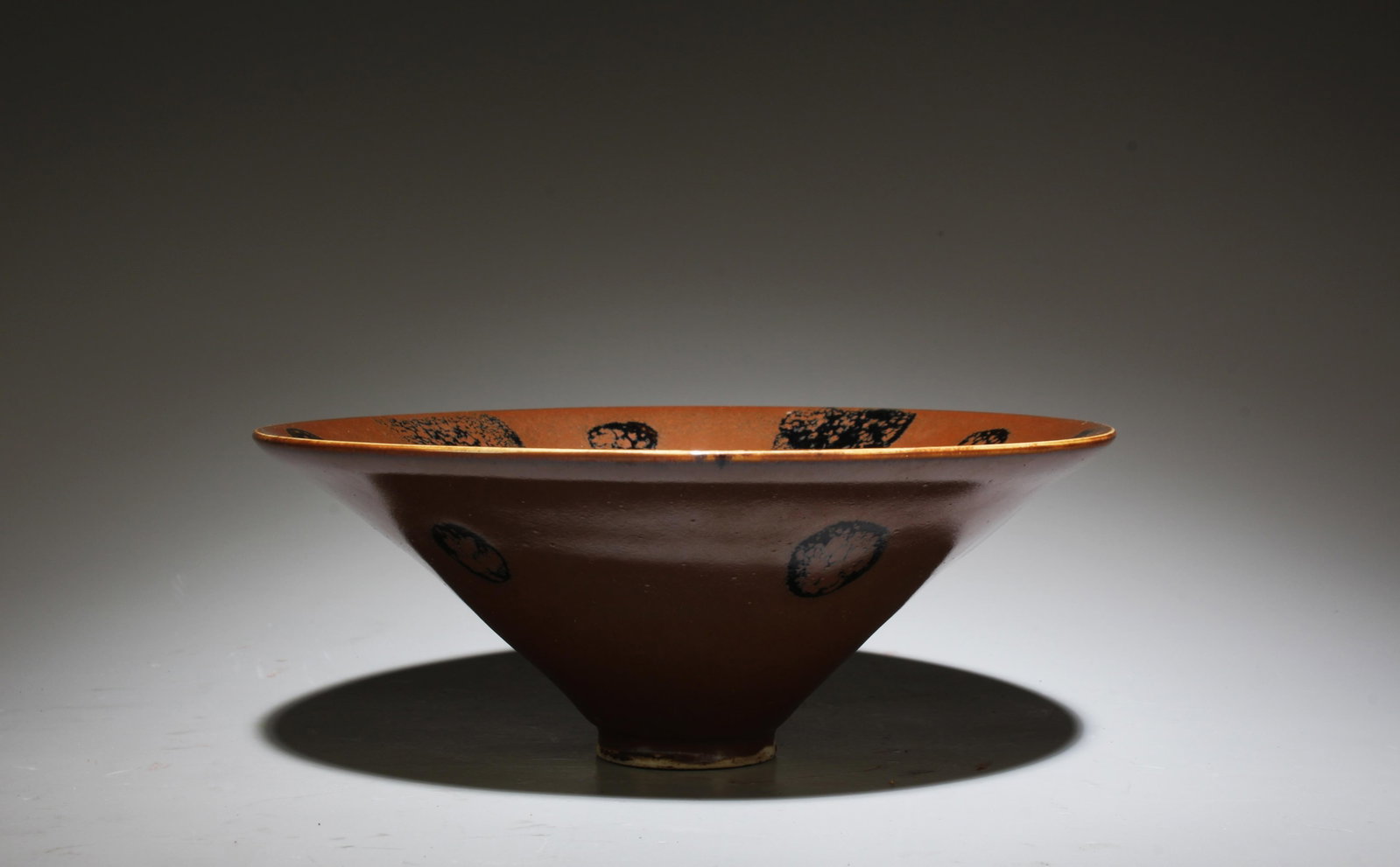 A Dingyao Bowl: A Dingyao Bowl. Dimensions: 6" x 2.45".