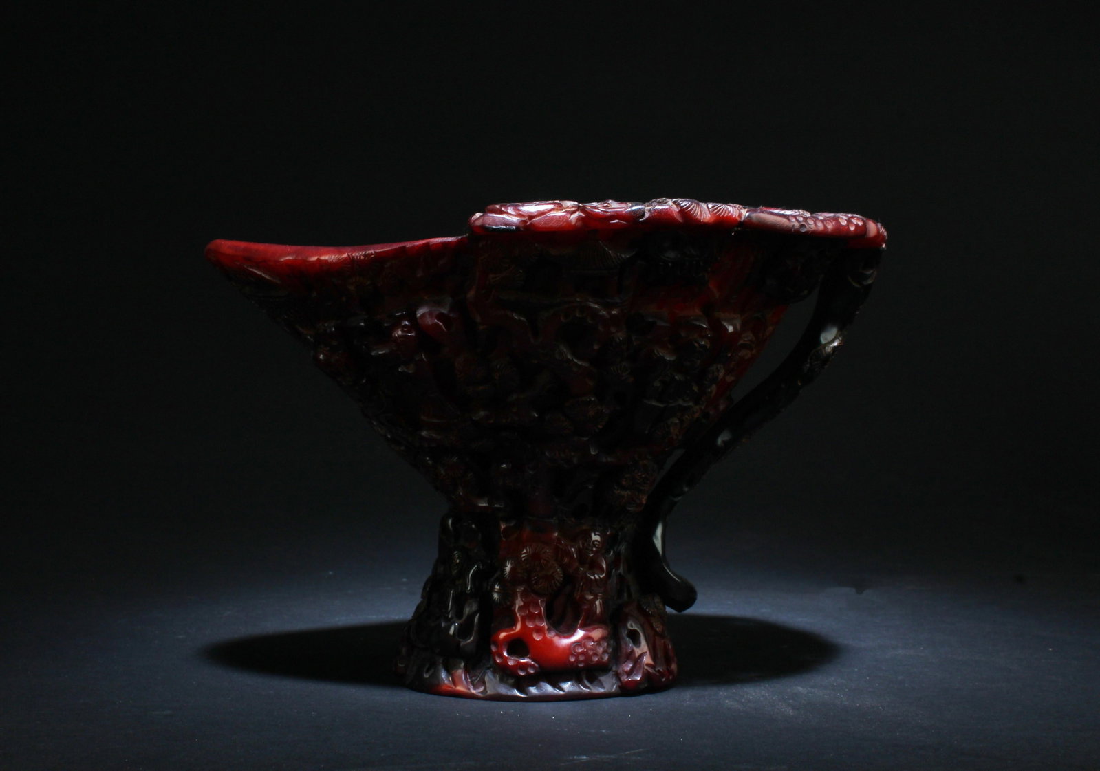A Carving Engraved Cup: A Carving Engraved Cup. Dimensions: 7.5" x 5".