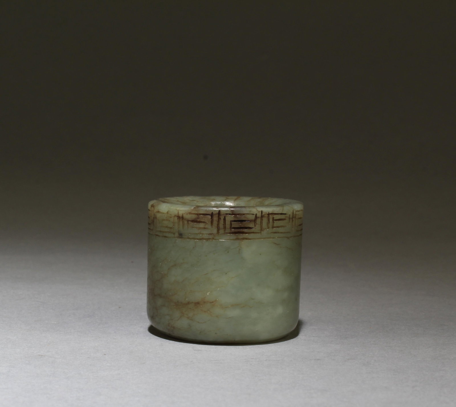 An Old Carved Jade Archer's Ring: An Old Carved Jade Archer's Ring. Outer Diameter: 1.3" Inner Diameter: 0.8"