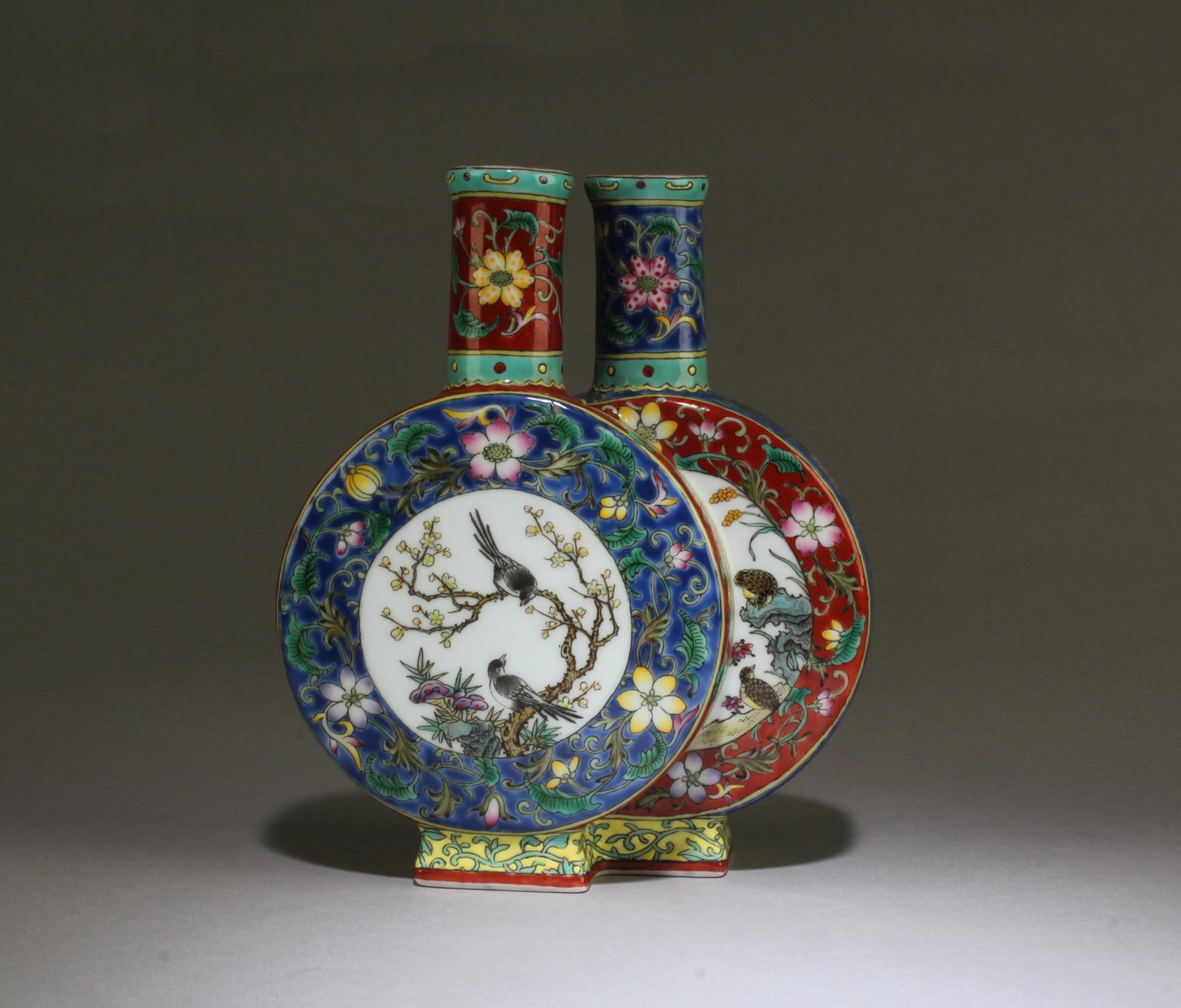 A Twin Inter-locked Porcelain Vase: A Twin Inter-locked Porcelain Vase. 'YongZheng' mark at base. Height: 7.7"