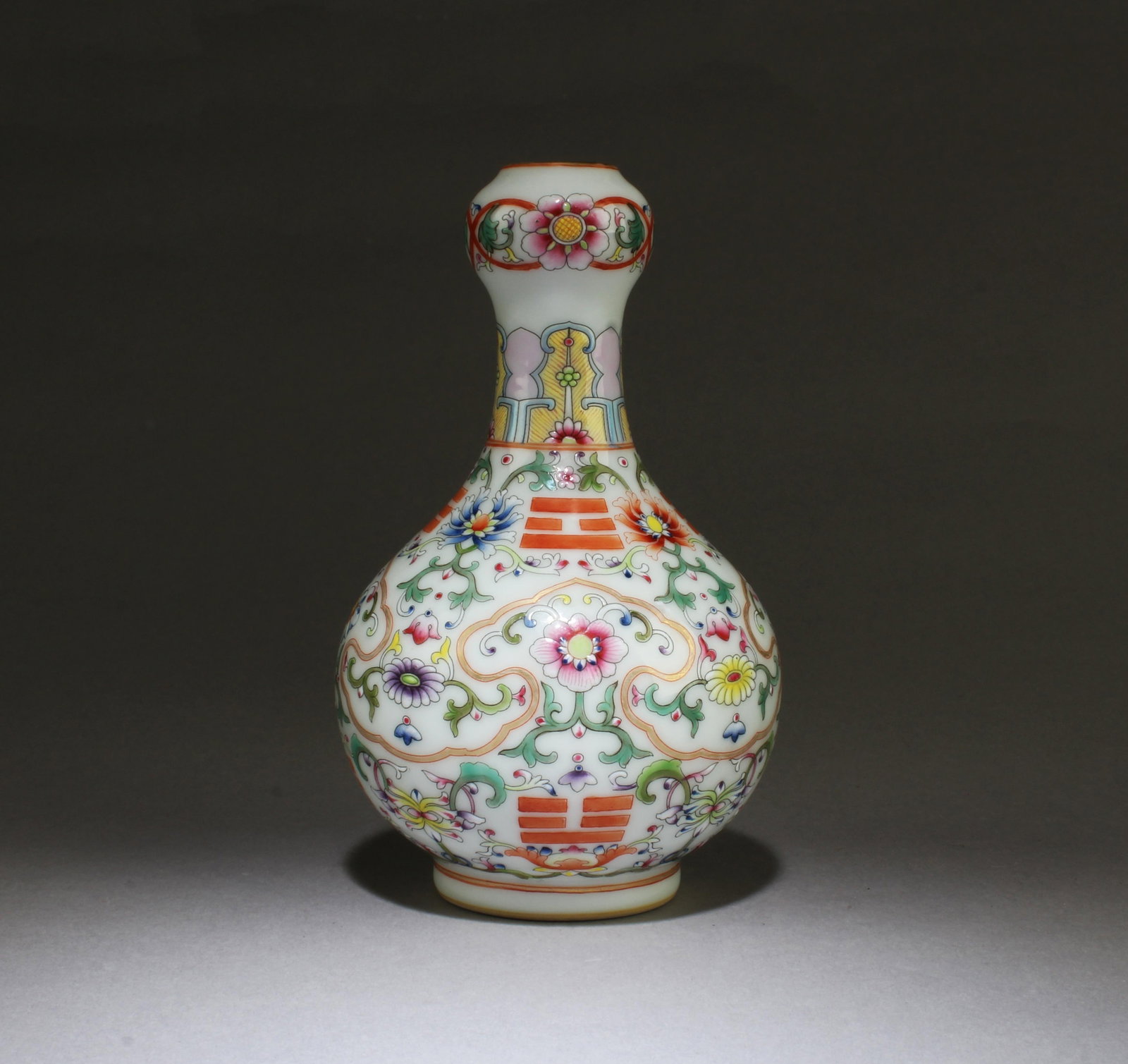 Chinese Porcelain Vase: Chinese Porcelain Vase. 'QianLong' mark at base. Height: 7"