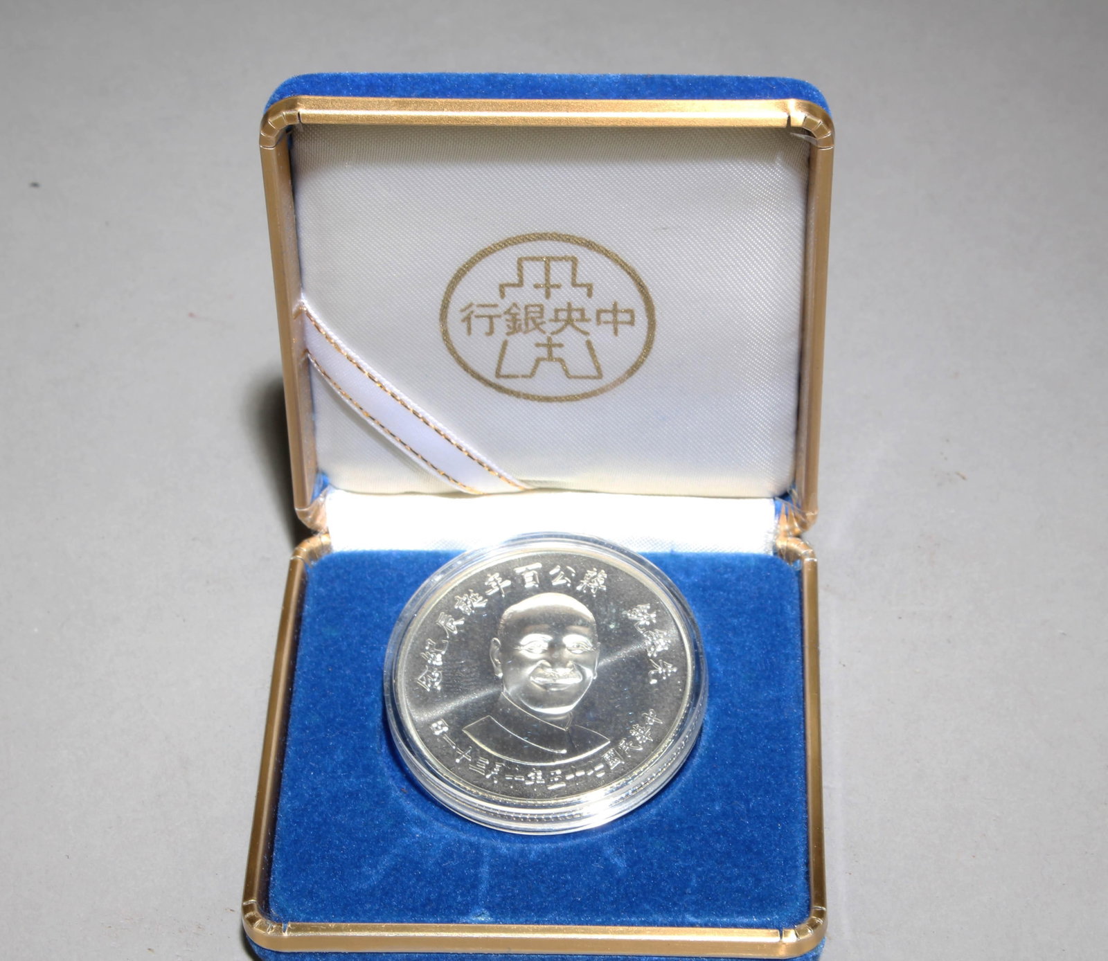 A Silver Coin: A Silver Coin. 27 Grams.