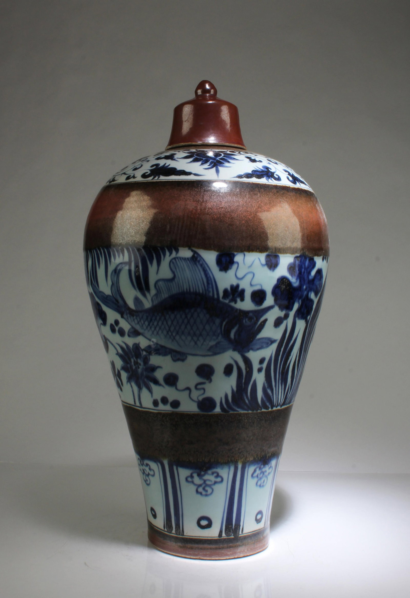 A Porcelain Meiping Vase: A Porcelain Meiping Vase with lid. Height: 19"