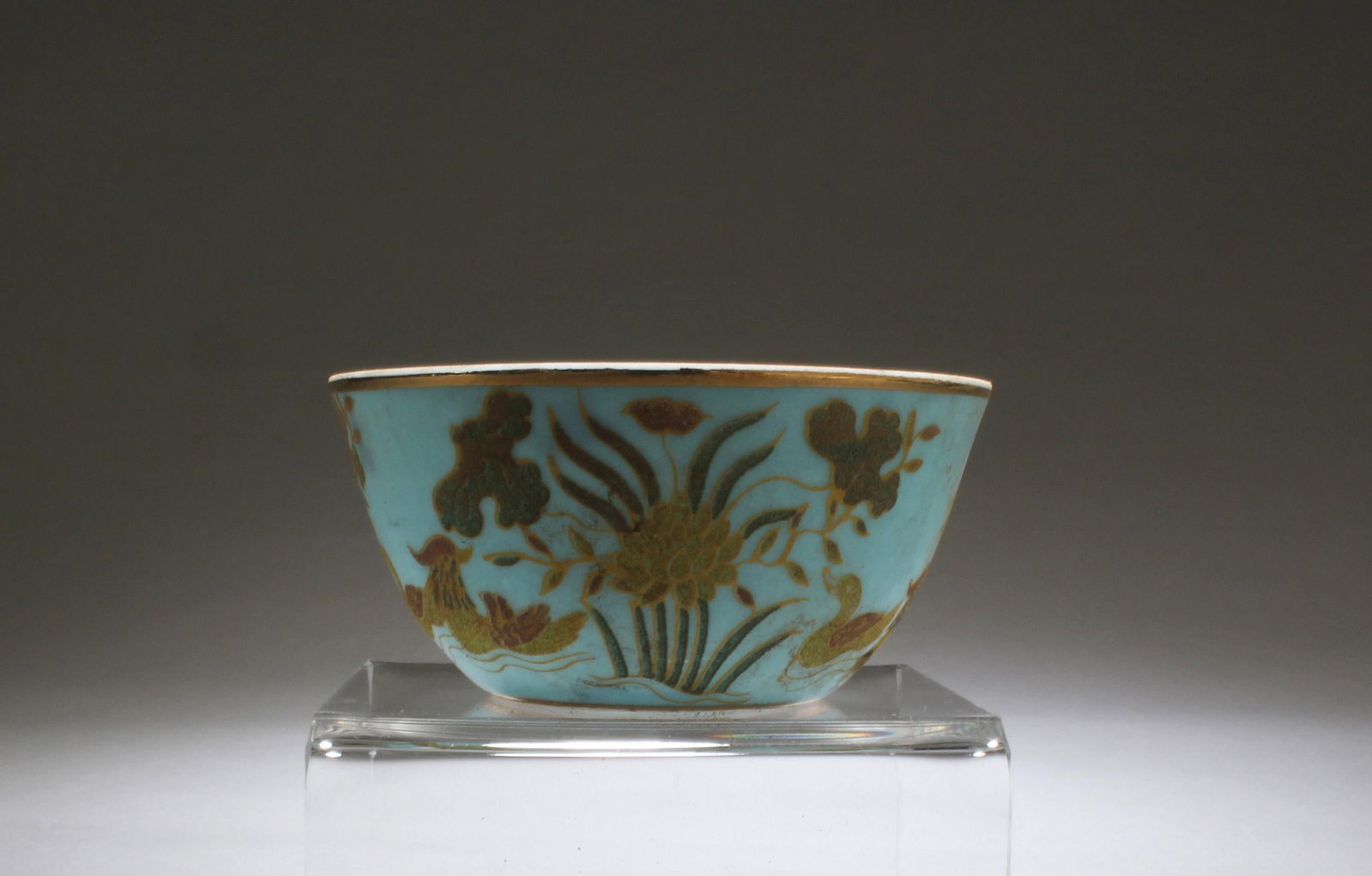 A Porcelain Cup: A Porcelain Cup. Seal mark at base. Diameter: 3.2" Height: 1.5"