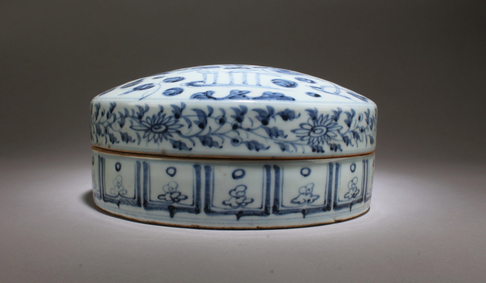 A Blue & White Round Container - 2