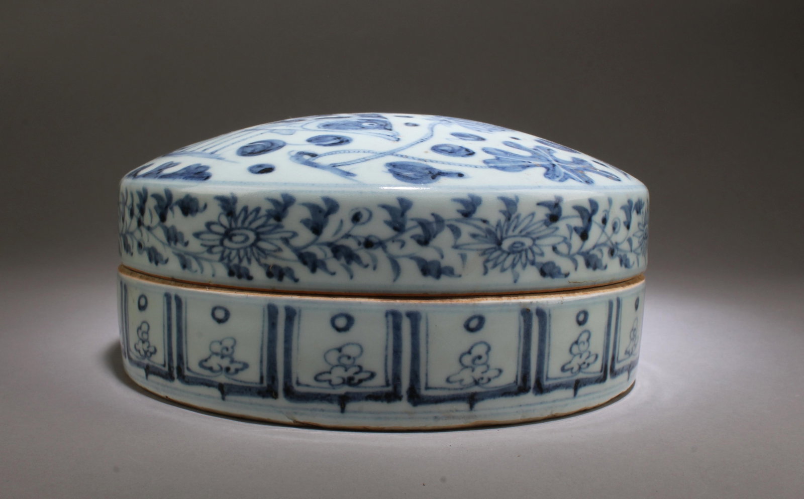 A Blue & White Round Container - 3