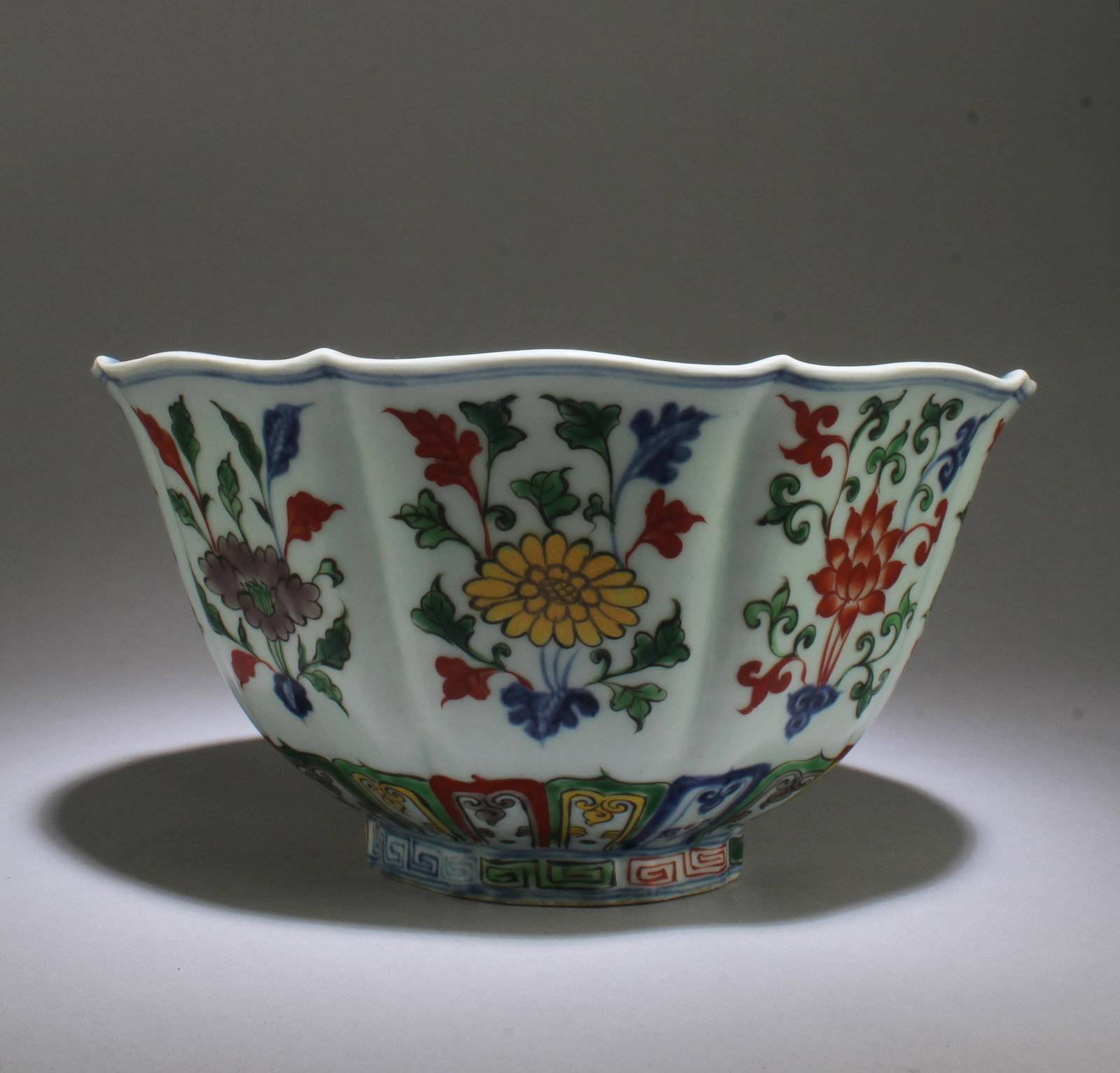 A Large Famille Rose Porcelain Bowl: A Large Famille Rose Porcelain Bowl. 'XuanDe' mark. Height: 4.75" Diameter: 9.3"