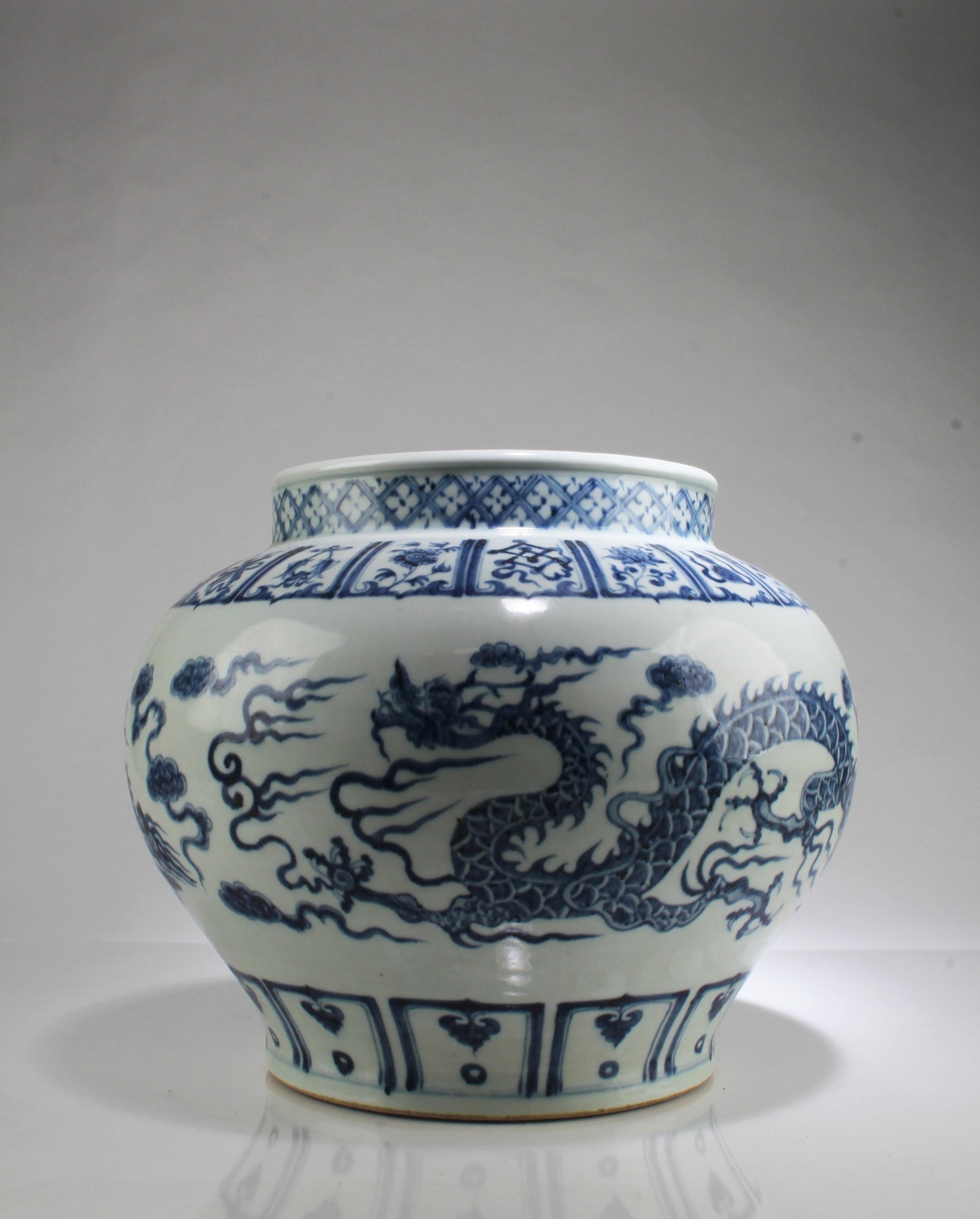 A Blue & White Porcelain Jar: A Blue & White Porcelain Jar. Height: 11.5" Diameter: 13"