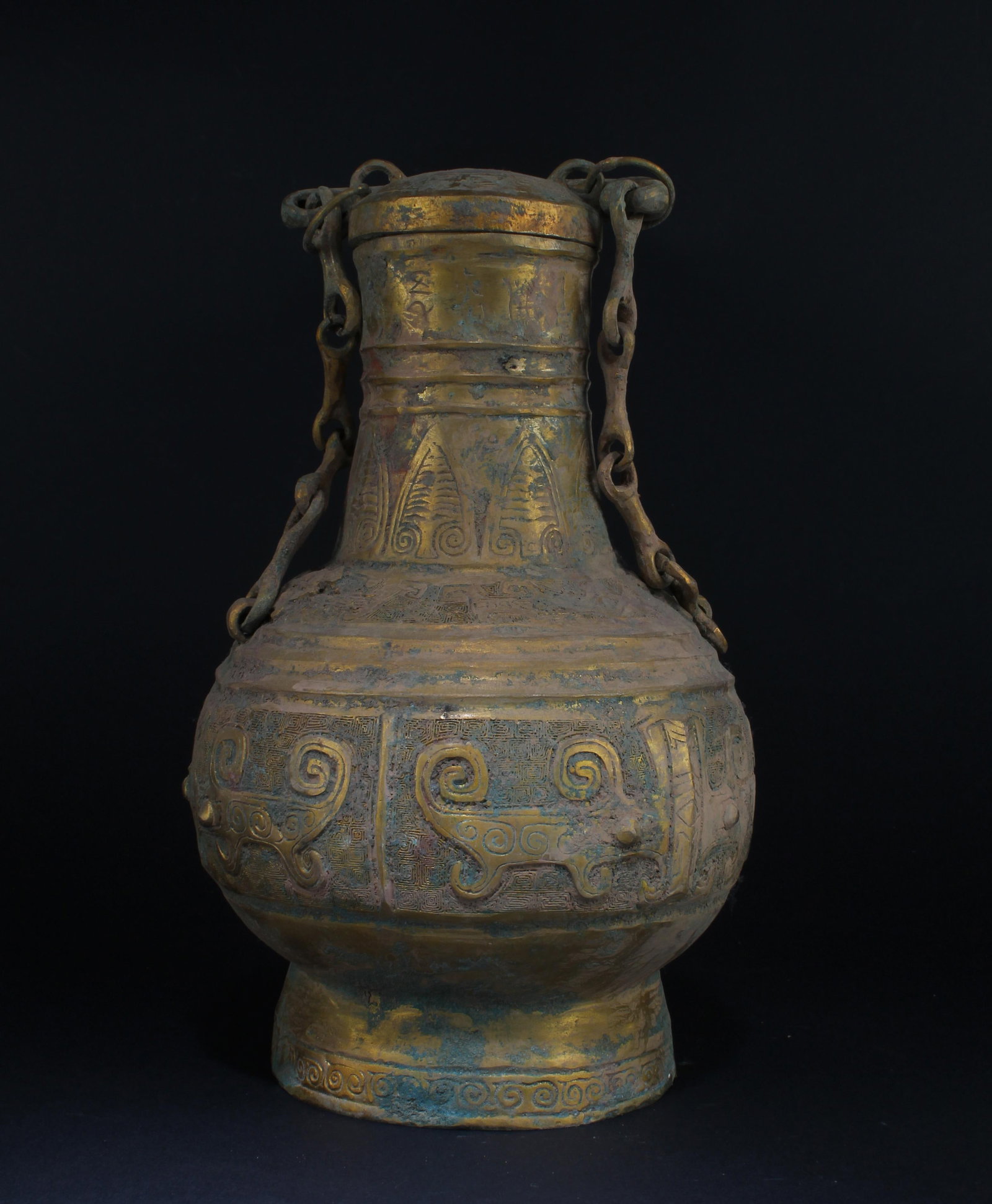 A Bronze Archaic Container: A Bronze Archaic Container. Height: 13.5"