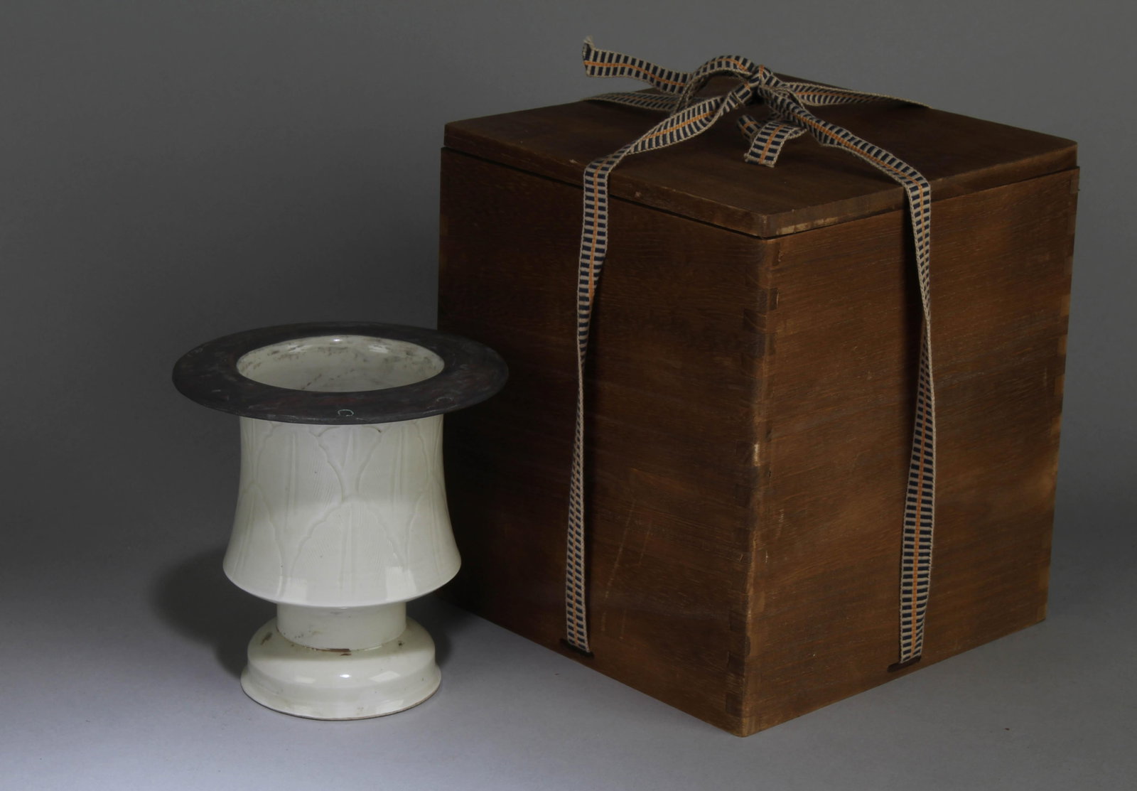 A Chinese Dingyao Cup: A Chinese Dingyao Cup. Dimensions: 5" x 5".