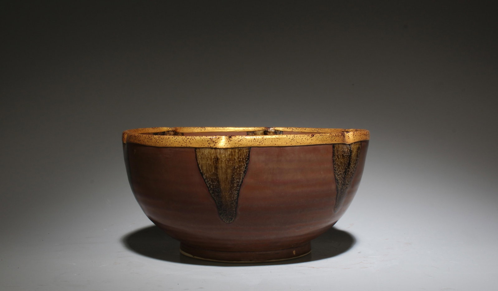 A Jianyao Bowl: A Jianyao Bowl. Dimensions: 5.5" x 2.75".