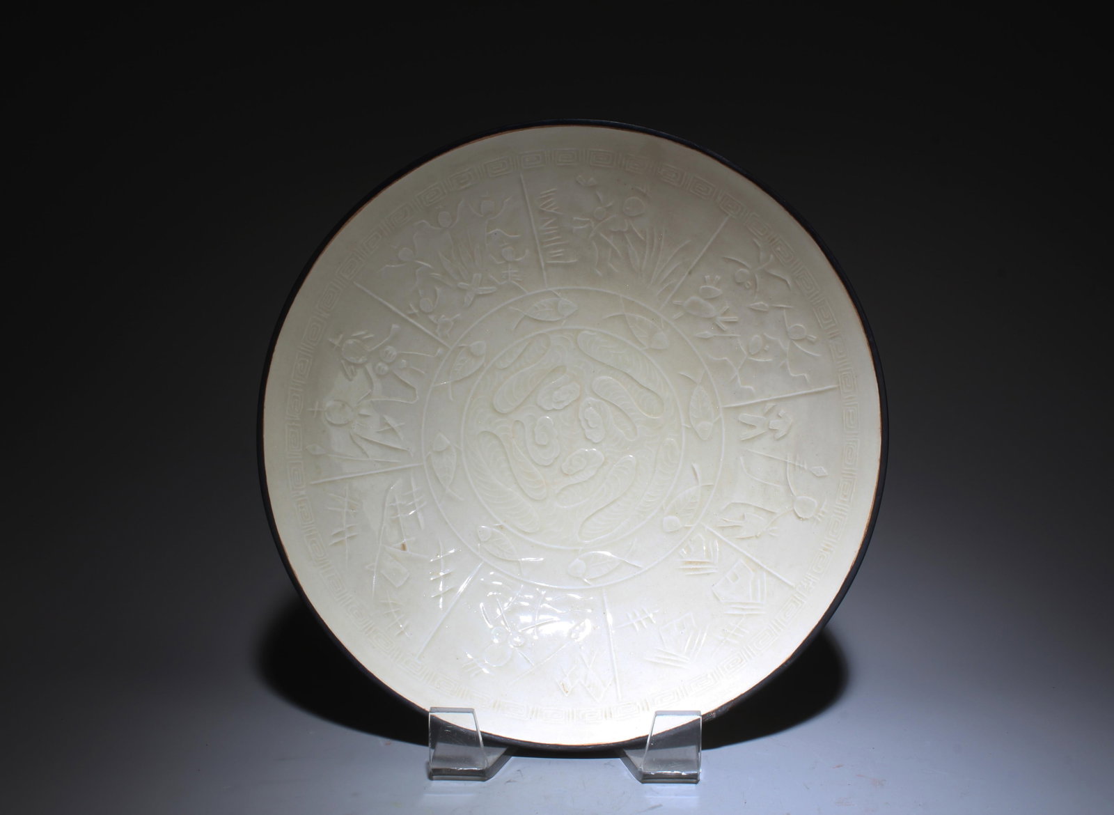 A Dingyao Plate: A Dingyao Plate. Dimensions: 8.5" x 1.9".