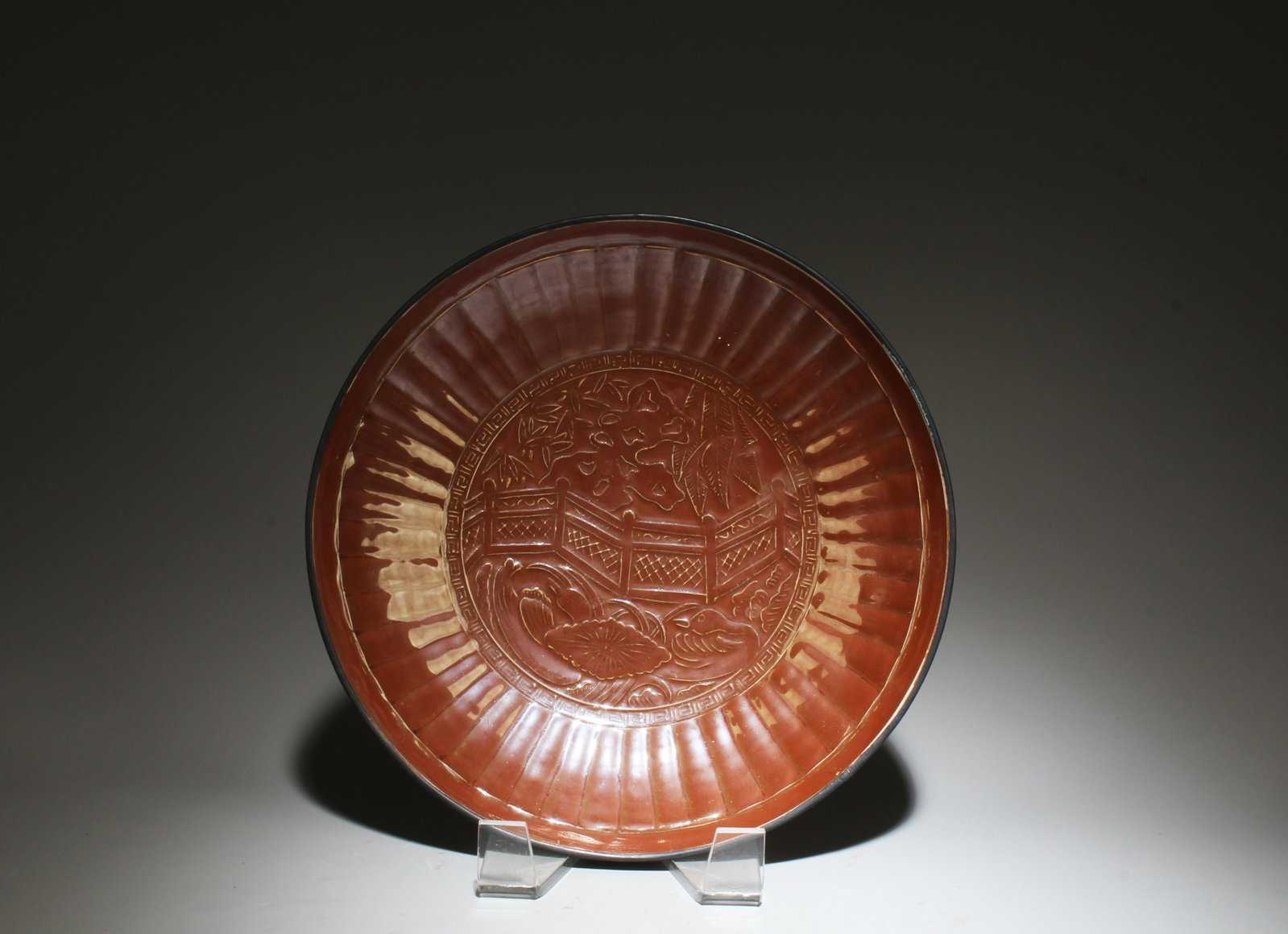 A Dingyao Plate: A Dingyao Plate. Dimensions: 8.25" x 1.7".