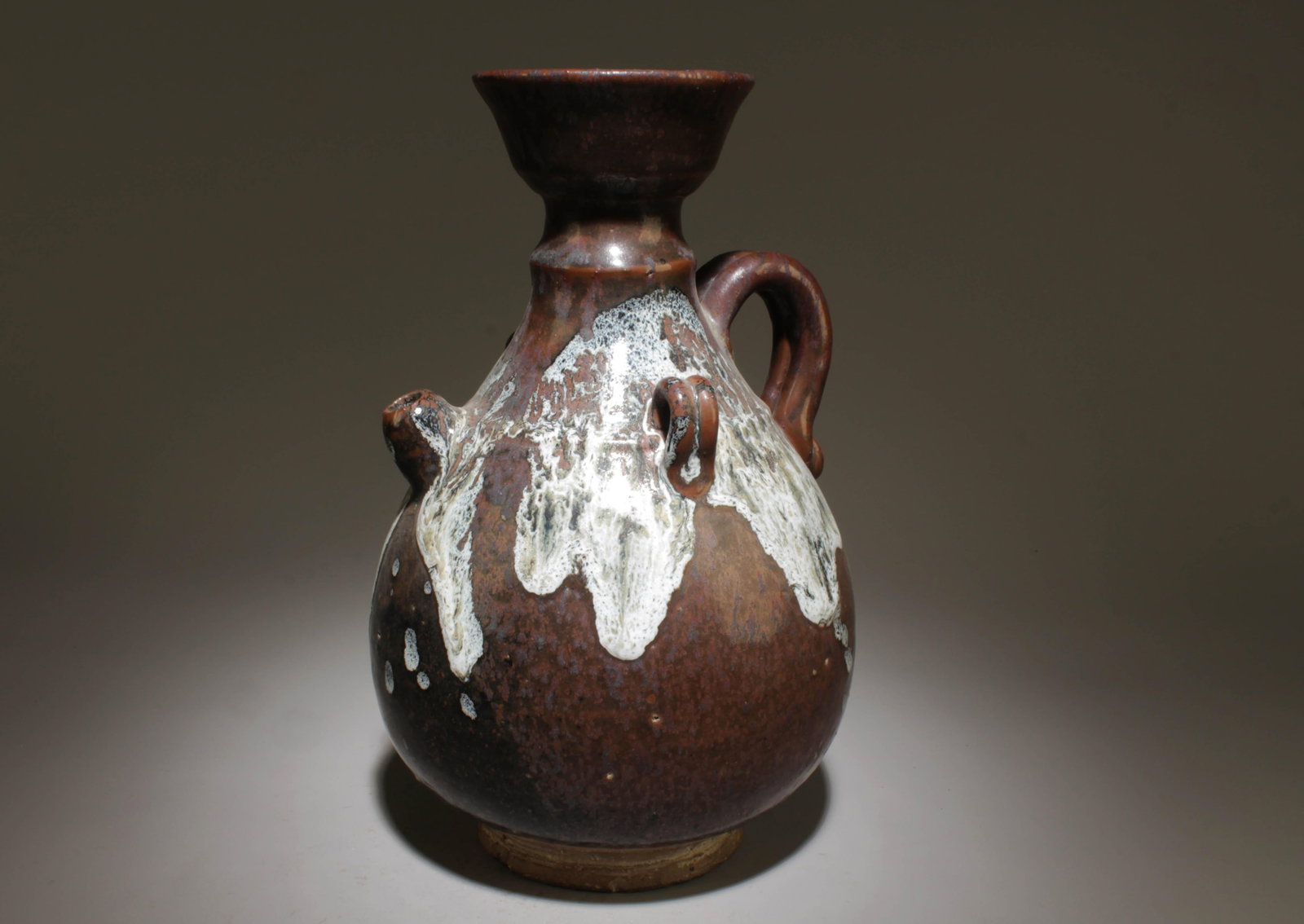A Pottery Pot: A Pottery Pot. Dimension: 6.5" x 11".