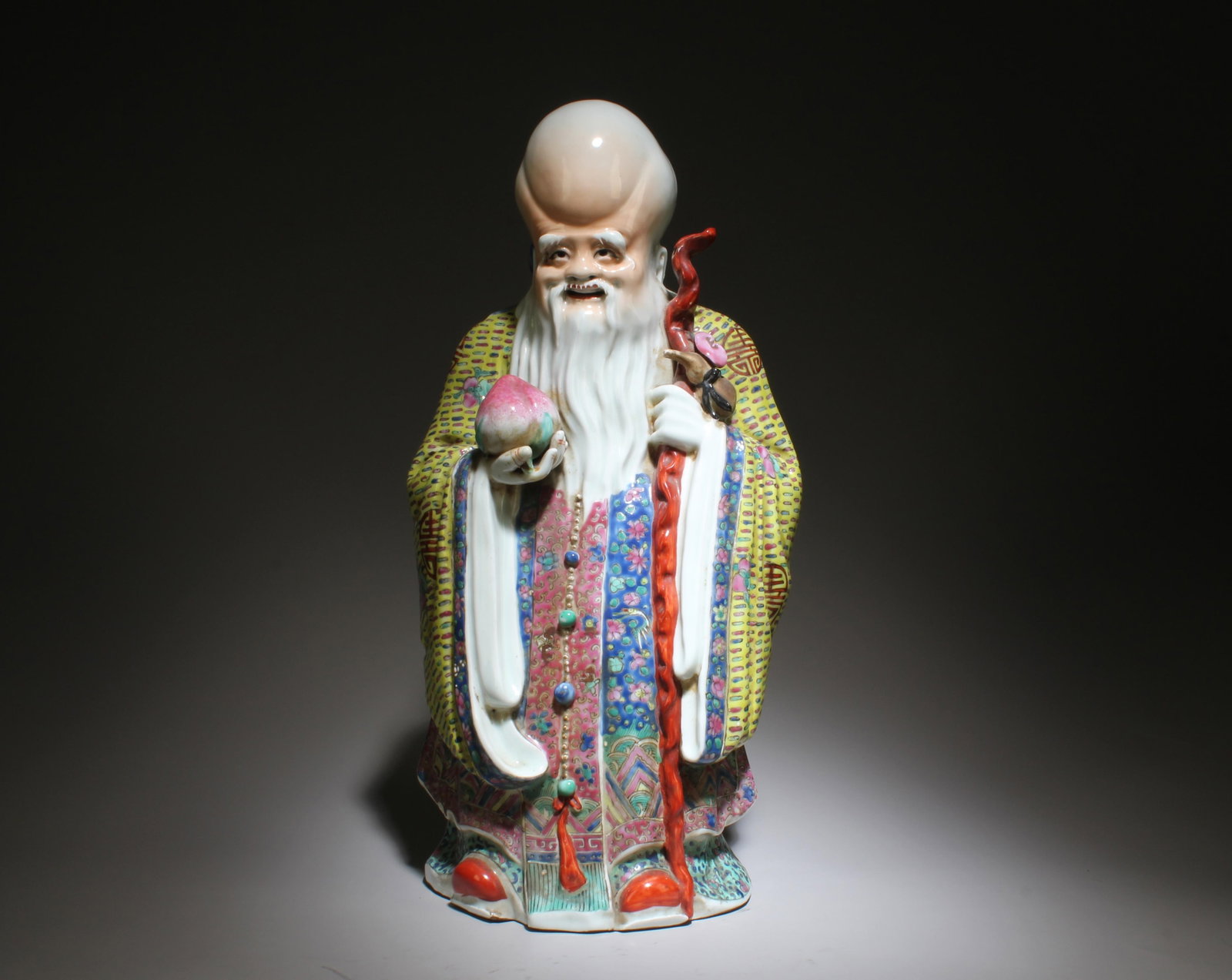 A Fencai Figure of Shouxing: A Fencai Figure of Shouxing. Dimensions: 14.5" x 7.5".