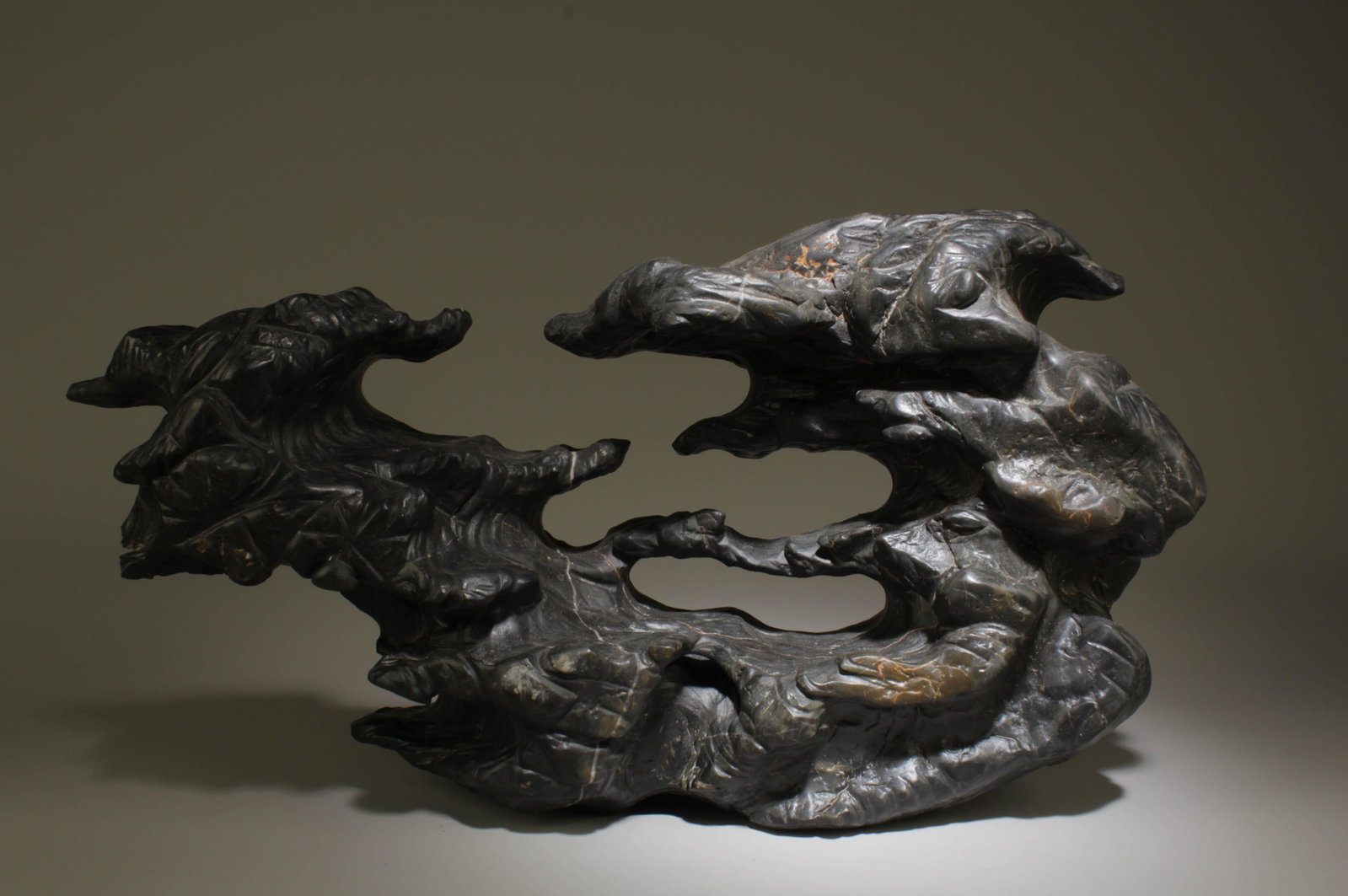 A Stone Decorative Ornament: A Stone Decorative Ornament . Dimension: 21" x 11" x 6.25".