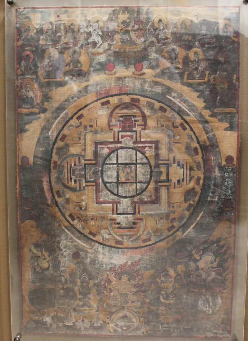 A Framed Thangka: A Framed Thangka. Length: 17.25" Height: 26.5"