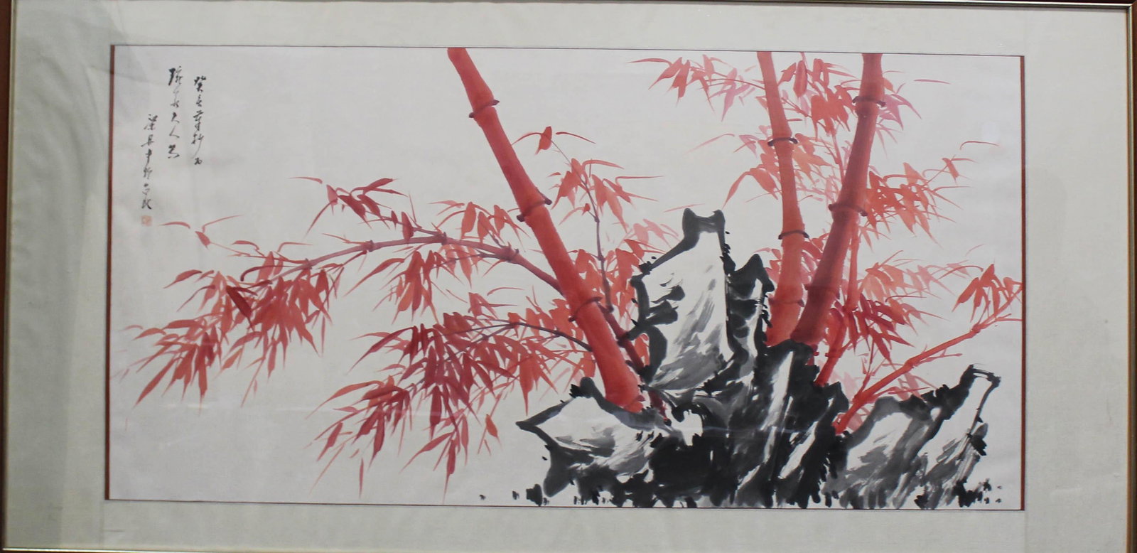 A Framed Painting: Ink and color on paper, depicting red color bamboo trees. Length: 69" Height: 36" (Frame)
