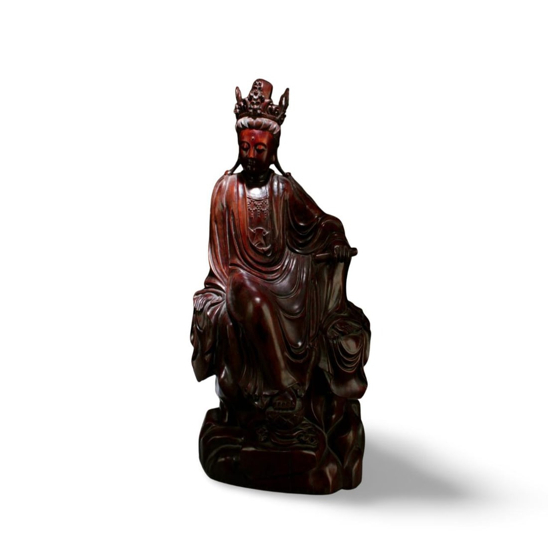 An Antique Hardwood Guanyin Statue: An Antique Hardwood Guanyin Statue. Dimension: 27" x 12" x 8".