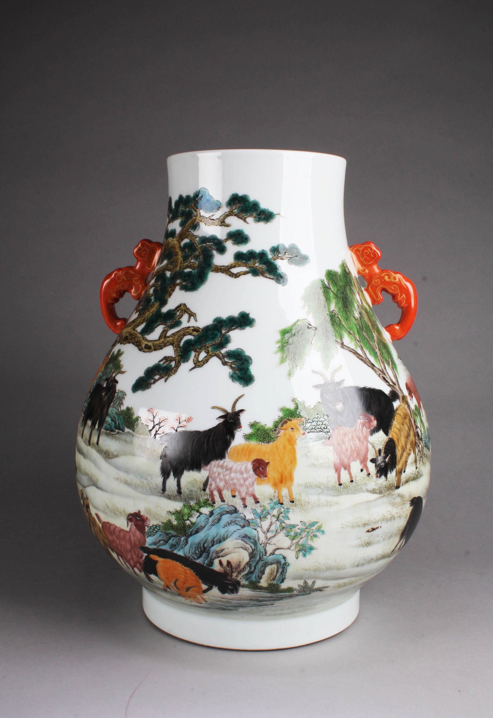 Chinese Porcelain Vase: Chinese Porcelain Vase, flanked by twin handles. 'QianLong' mark at base. Height: 19.25"