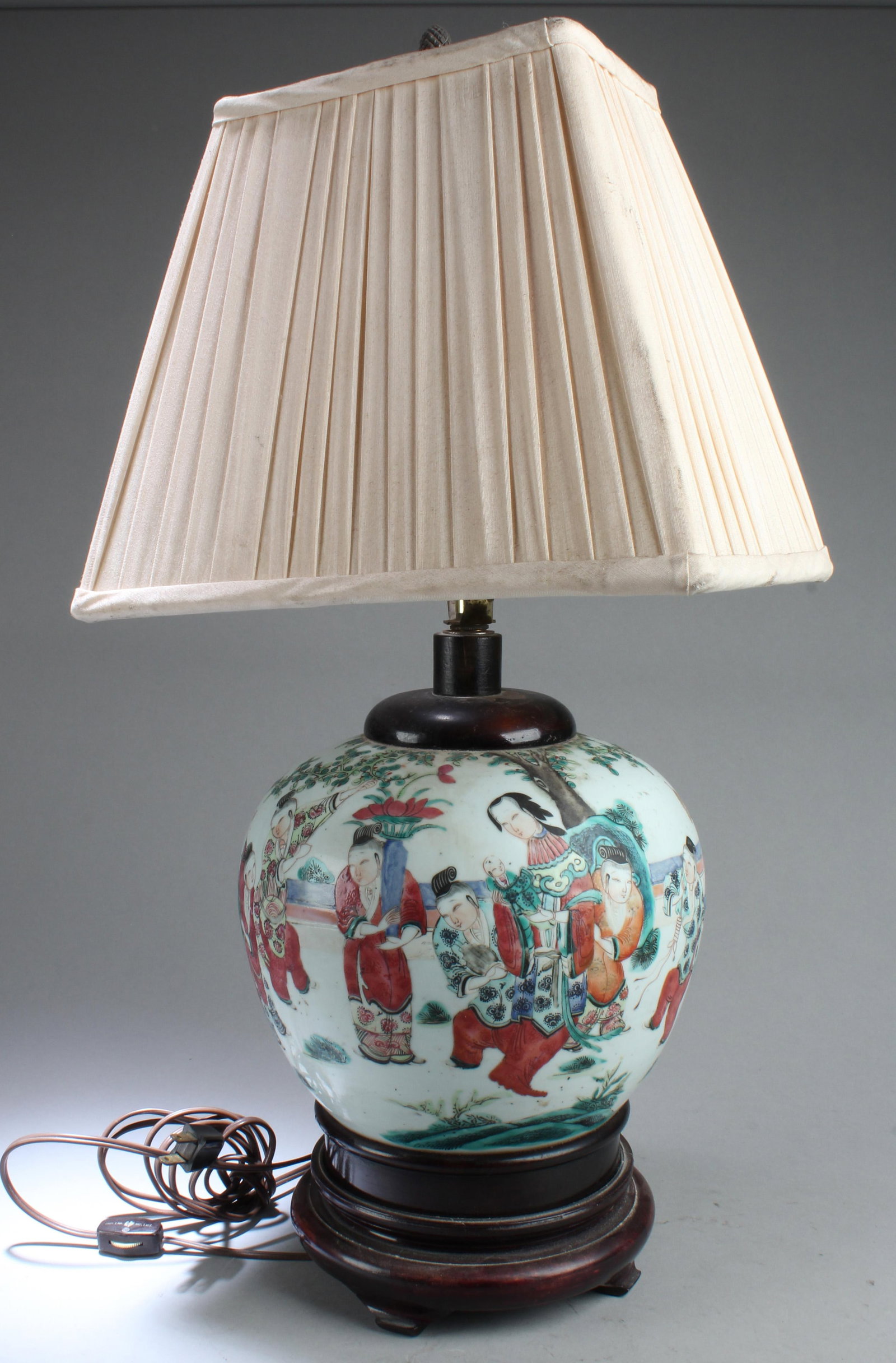 Chinese Porcelain Lamp: Chinese Porcelain Lamp with shade. Comes fitted with a wood stand. Height: 24.25"