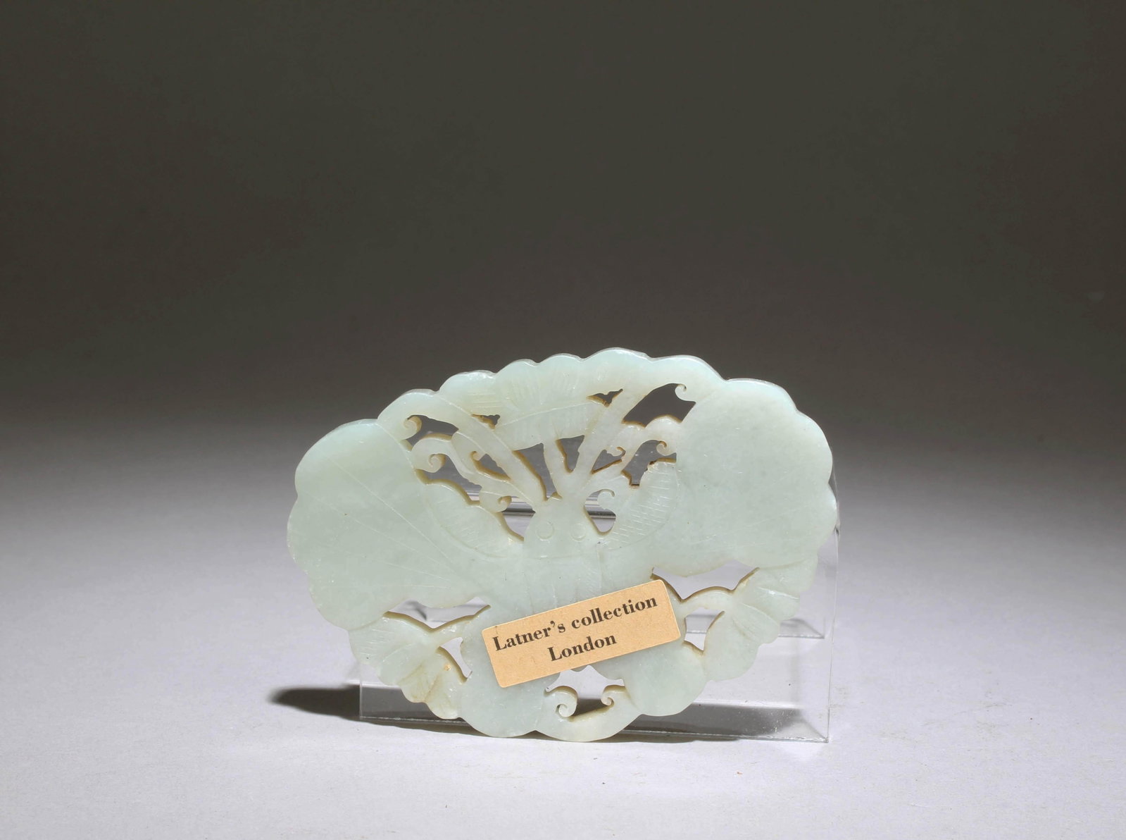 A Jade Pendant: A Jade Pendant. Dimensions: 3.5" x 2.5"..