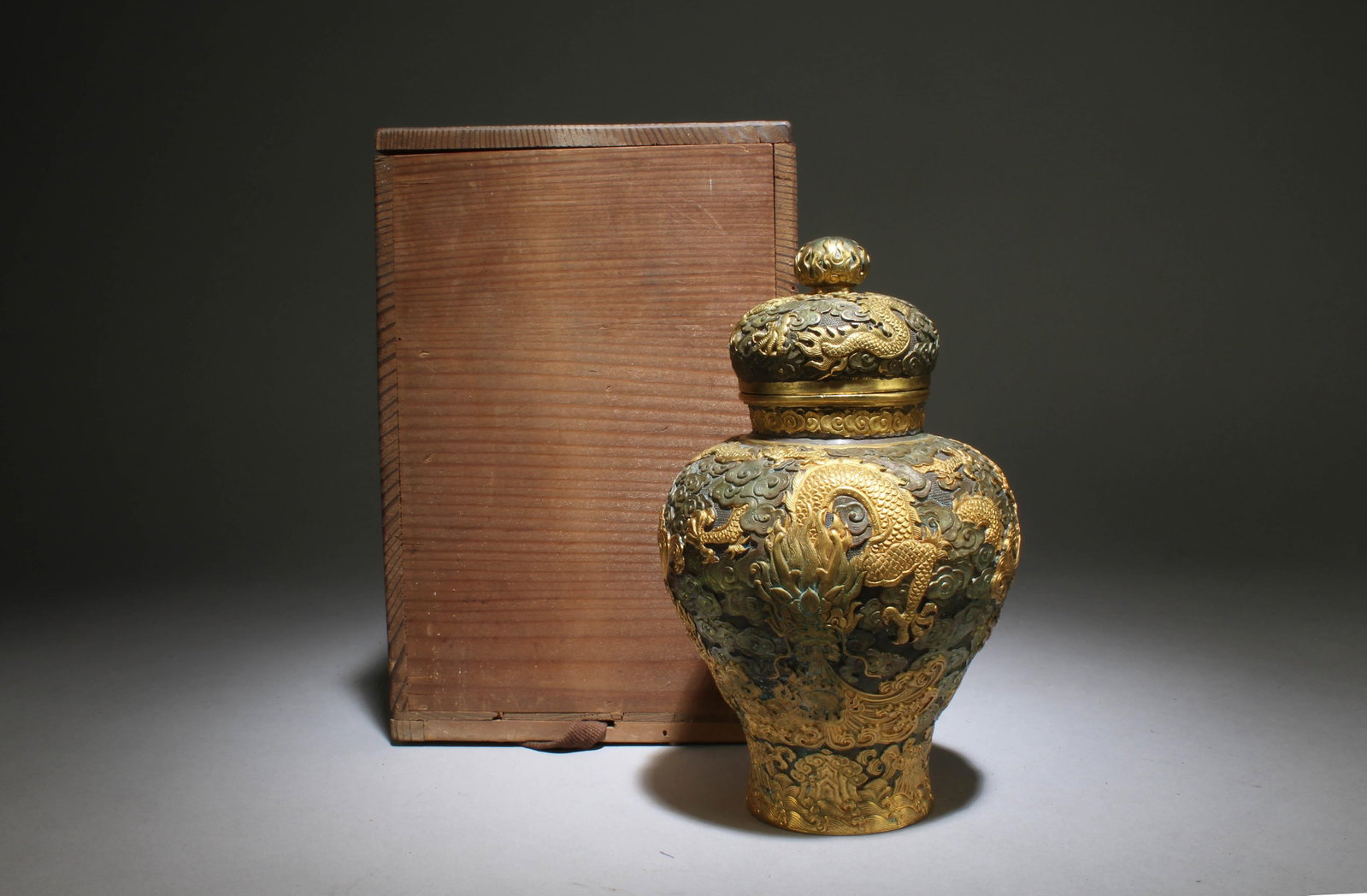 A Gilt Bronze Jar with Dragon: A Gilt Bronze Jar with Dragon. Dimensions: 6.5" x 4.3".