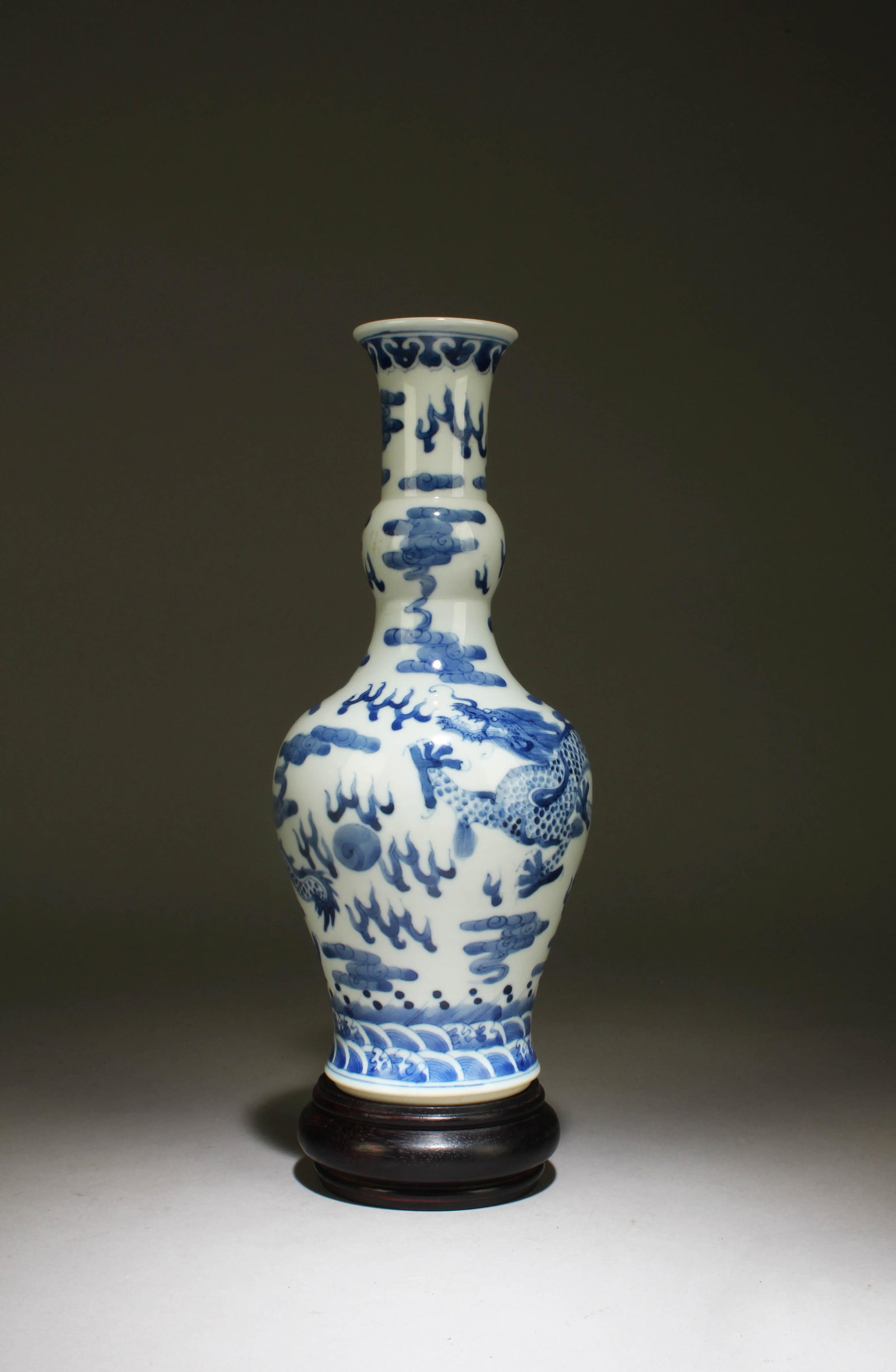 A Blue and White Vase with Stand: A Blue and White Vase with Stand. Dimensions: 11" x 5"