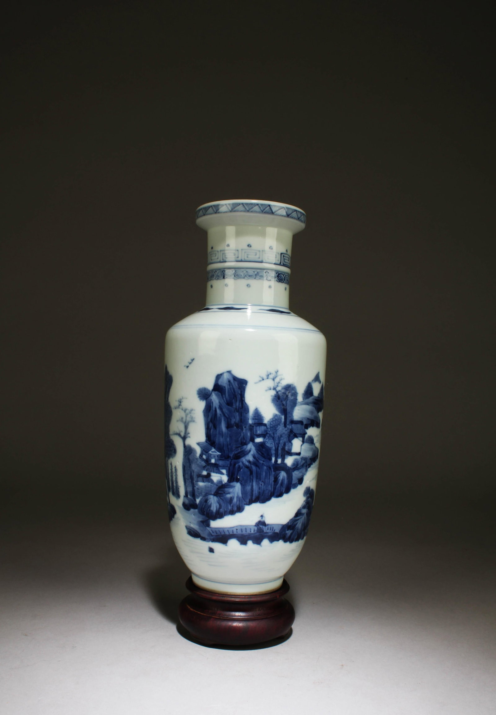 A Blue and White Vase with Stand: A Blue and White Vase with Stand. Dimensions: 9.7" x 4.2"
