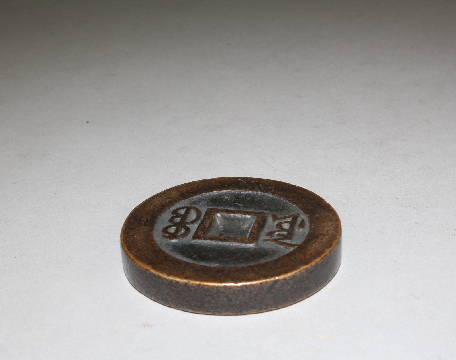 A Bronze Coin - 7