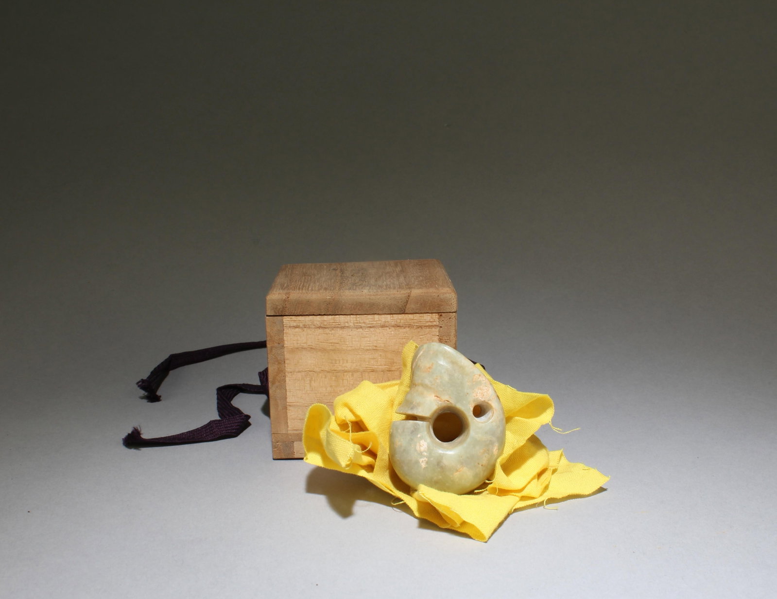 A Chinese Jade with Box: A Chinese Jade with Box. Dimensions: 1.5" x 1.2"
