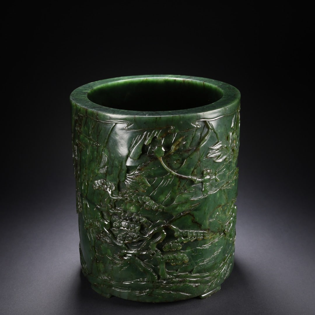 QING DYNASTY HETIAN JADE LANDSCAPE AND FIGURE PEN HOLDER: QING DYNASTY HETIAN JADE LANDSCAPE AND FIGURE PEN HOLDER. Width:15.3cm(6.02in), Height:17.9cm(7.05in), Weight:3577g (7.886lb)Carved from a single piece of spinach green Hetian jade with rich dark gree