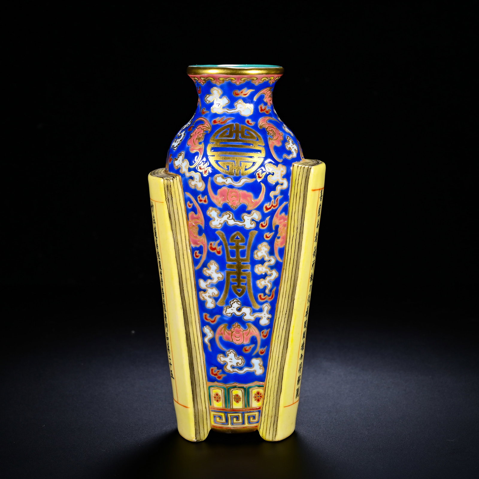 QING DYNASTY QIANLONG PASTEL IMITATION BOOK-STYLE BLESSING AND LONGEVITY PATTERN VASE: QING DYNASTY QIANLONG PASTEL IMITATION BOOK-STYLE BLESSING AND LONGEVITY PATTERN VASE. Height:15cm(5.91in), Width:7.5cm(2.95in)Ingeniously modelled in the form of unfurled ancient scrolls. The
